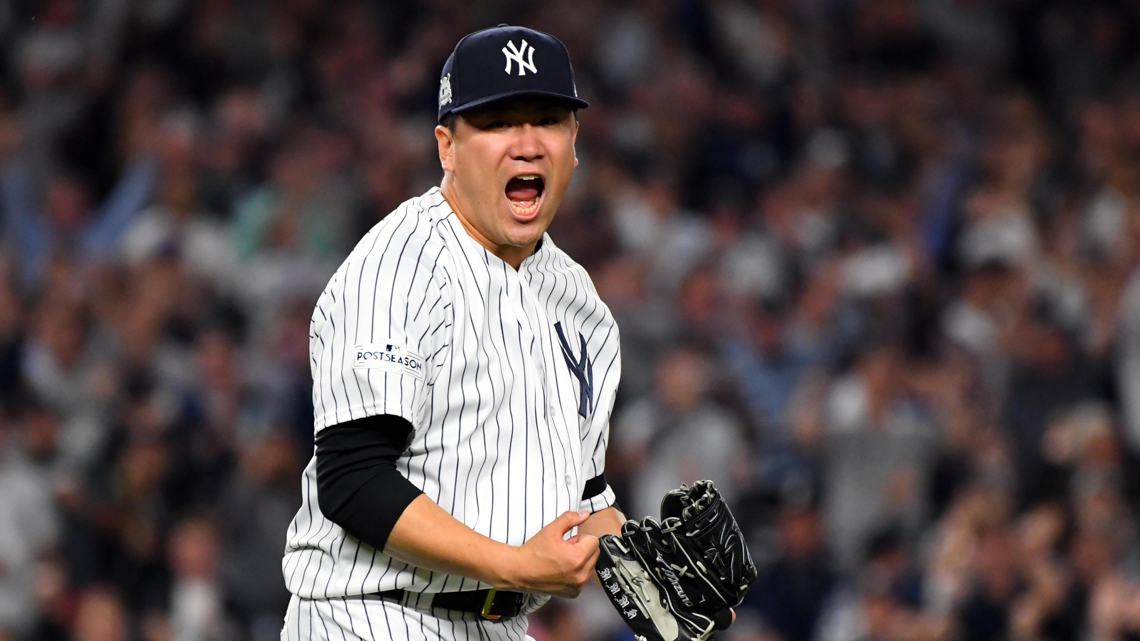 Oct 18, 2017; Bronx, NY, USA; New York Yankees starting pitcher Masahiro Tanaka (19) reacts after pitching during the fifth inning against the Houston Astros in game five of the 2017 ALCS playoff baseball series at Yankee Stadium. Mandatory Credit: Robert Deutsch-USA TODAY Sports / Robert Deutsch-USA TODAY Sports