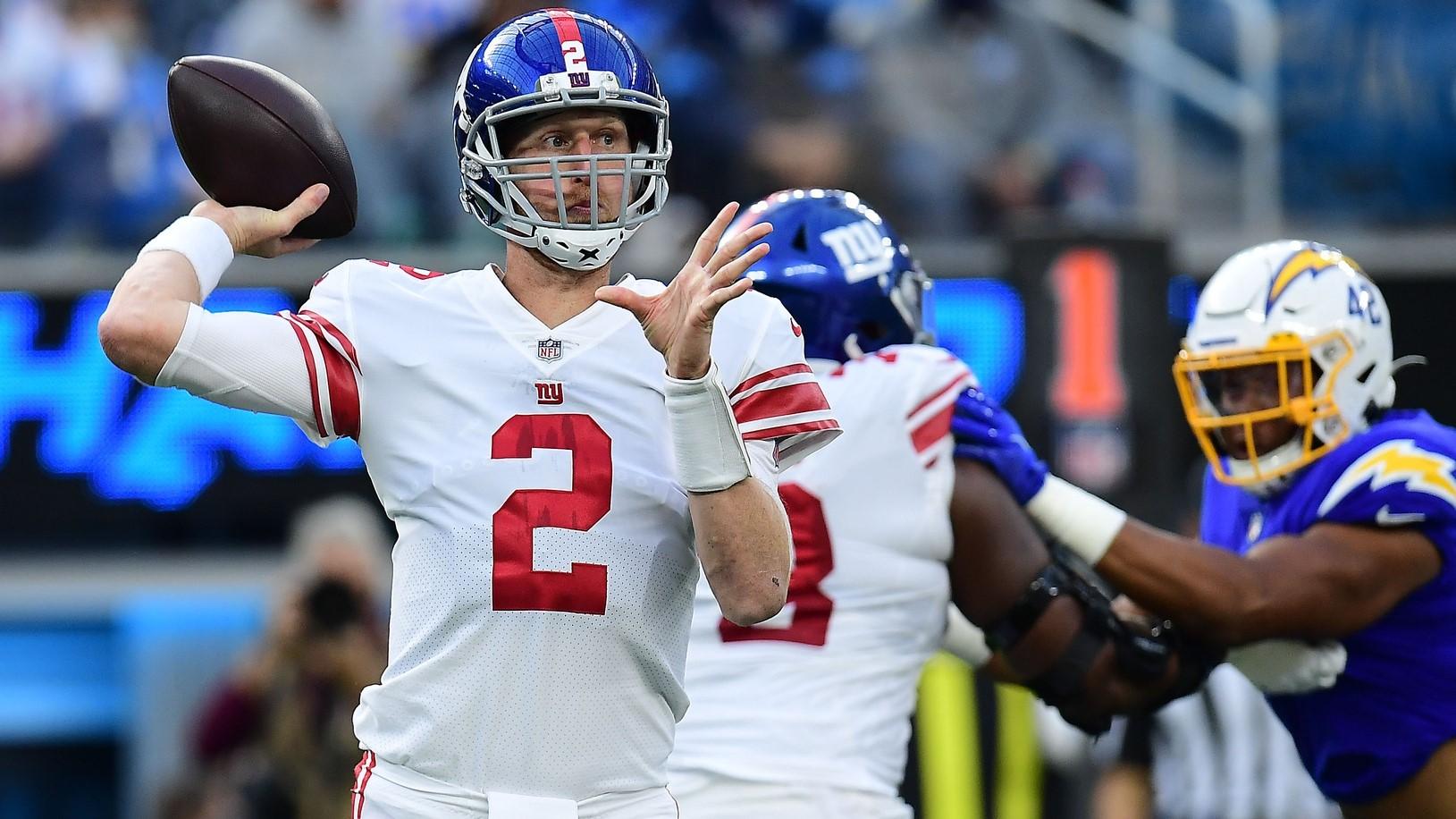 Dec 12, 2021; Inglewood, California, USA; New York Giants quarterback Mike Glennon (2) throws against the Los Angeles Chargers during the first half at SoFi Stadium. / Gary A. Vasquez-USA TODAY Sports