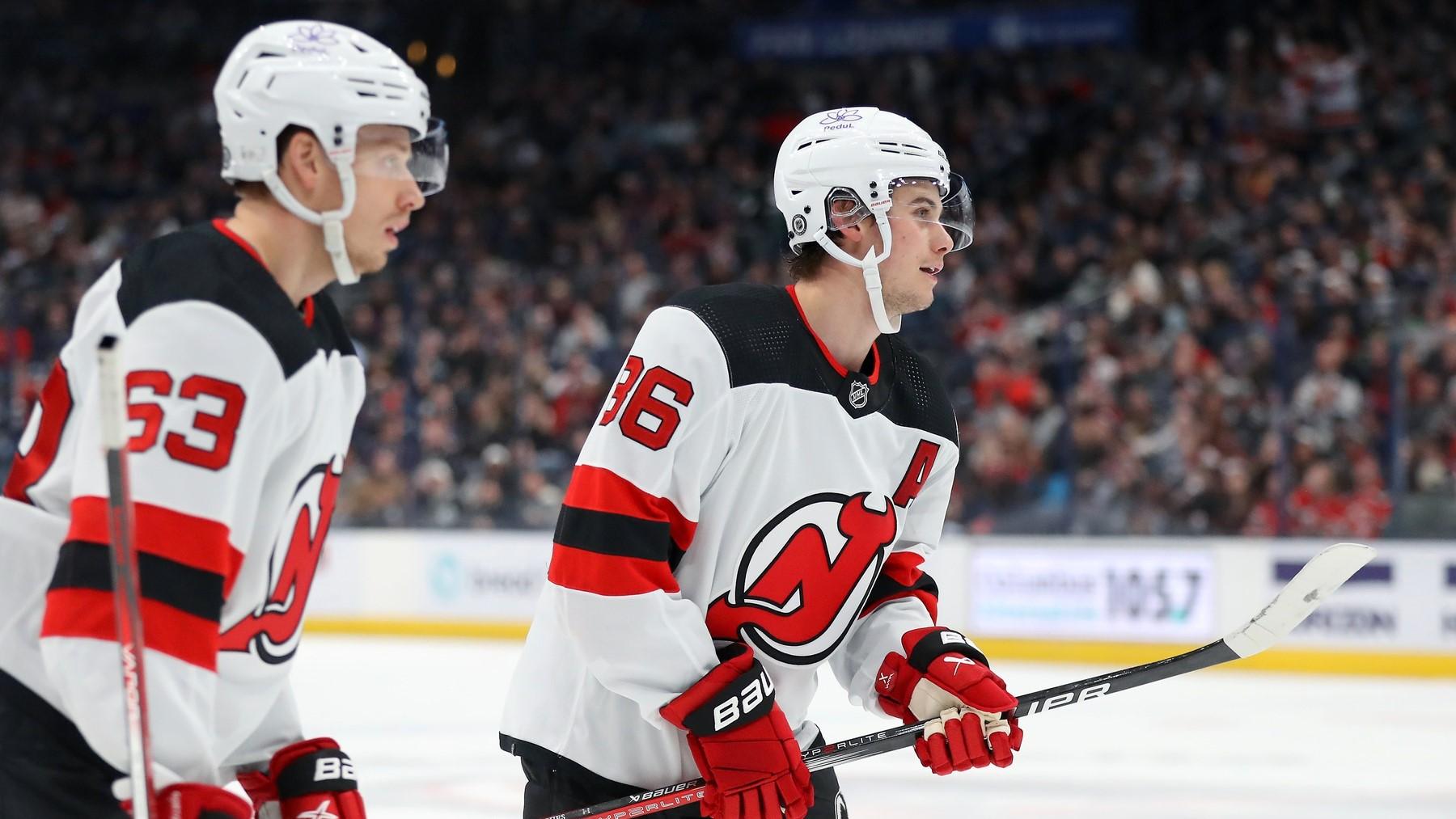 Dec 16, 2023; Columbus, Ohio, USA; New Jersey Devils center Jack Hughes (86) celebrates his second goal of the game with left wing Jesper Bratt (63) during the second period against the Columbus Blue Jackets at Nationwide Arena. / Joseph Maiorana-USA TODAY Sports
