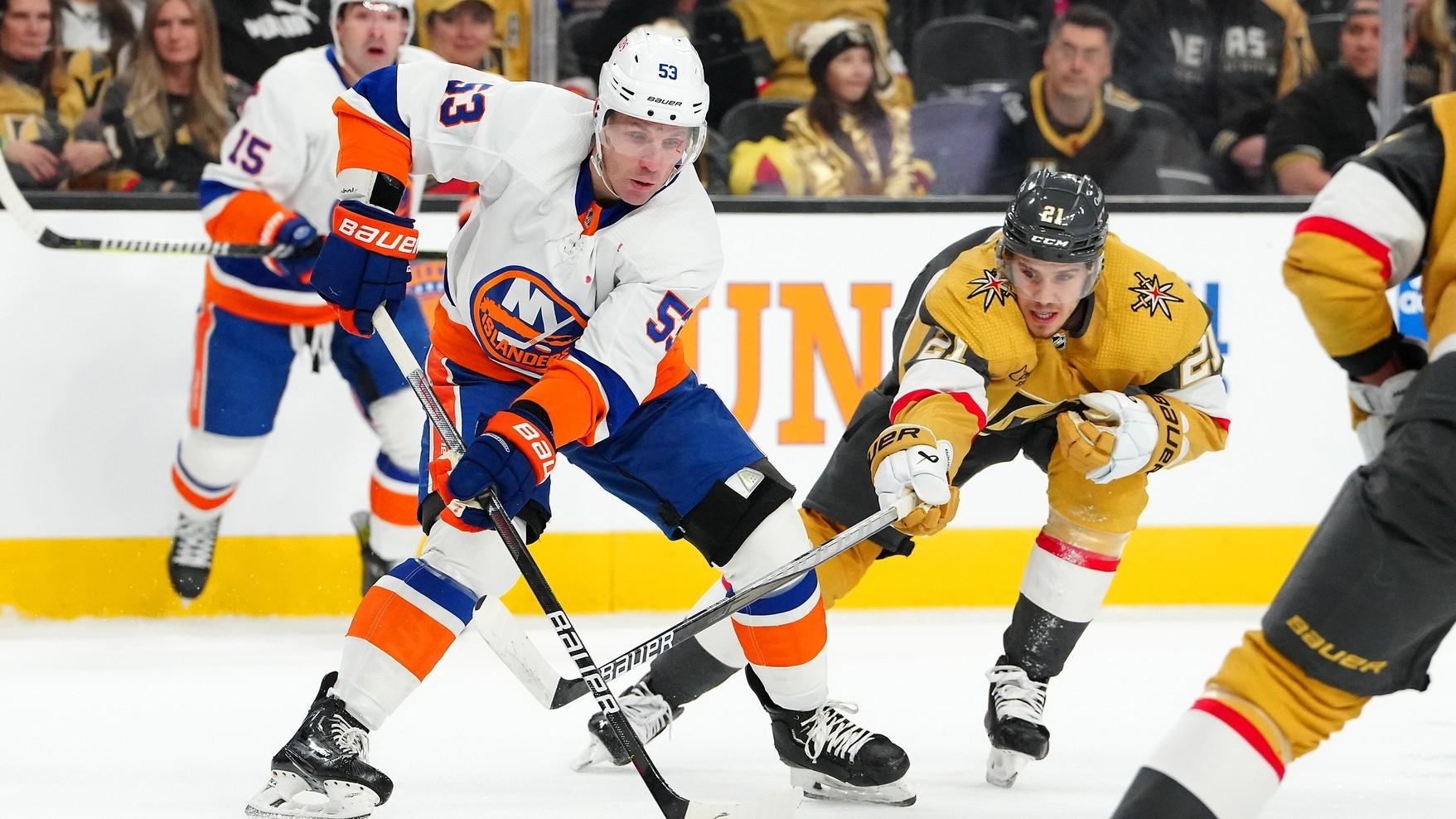 New York Islanders center Casey Cizikas (53) skates ahead of Vegas Golden Knights center Brett Howden (21) during the first period at T-Mobile Arena. / Stephen R. Sylvanie-USA TODAY Sports
