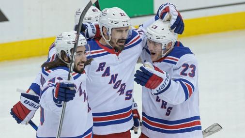 New York Rangers left wing Chris Kreider (20) celebrates his goal with center Mika Zibanejad (93) and defenseman Adam Fox (23) during the first period in game one of the first round of the 2023 Stanley Cup Playoffs against the New Jersey Devils at Prudential Center / Vincent Carchietta - USA TODAY Sports