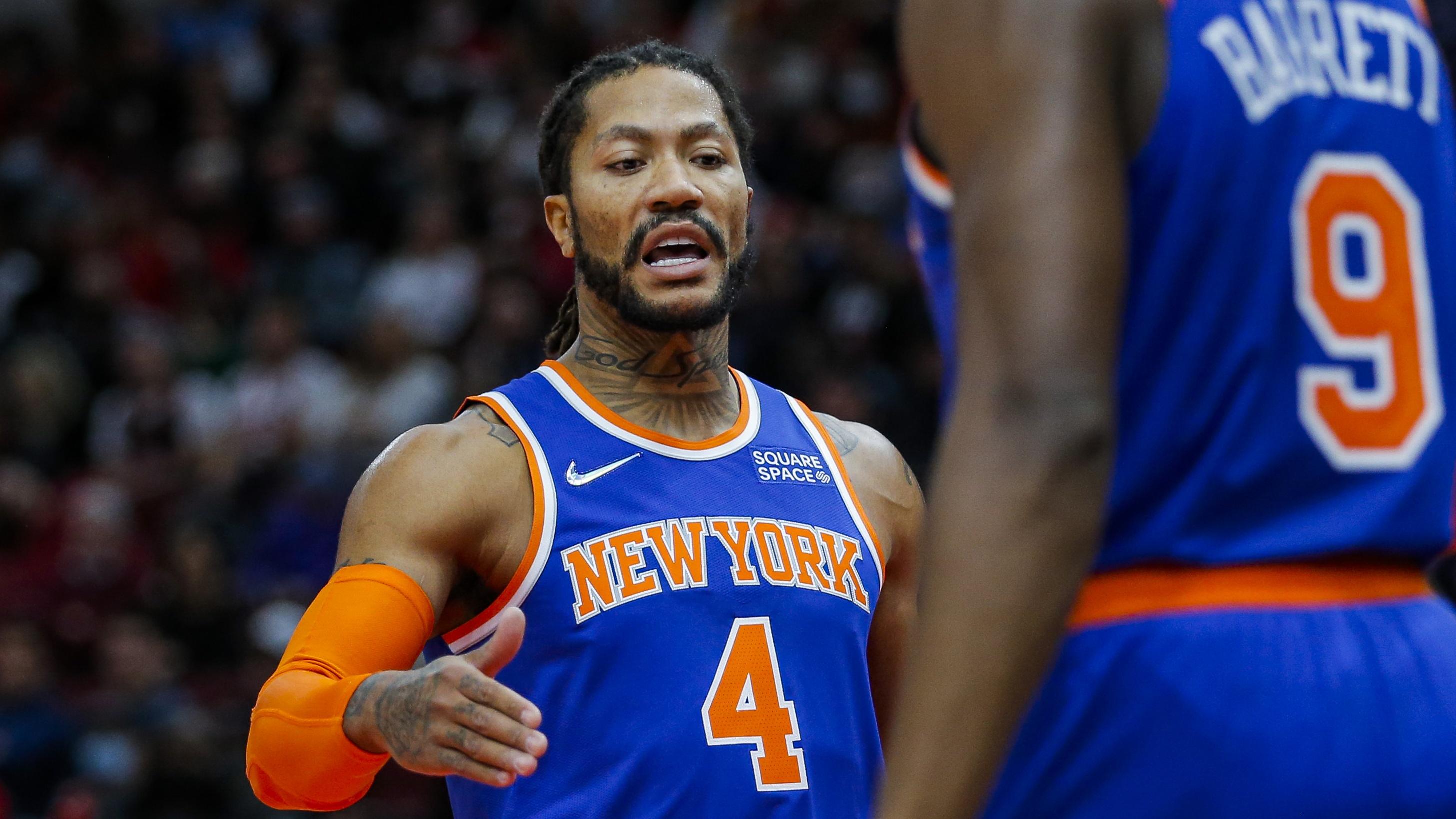 Nov 21, 2021; Chicago, Illinois, USA; New York Knicks guard Derrick Rose (4) reacts after a play against the Chicago Bulls with guard RJ Barrett (9) during the second half at United Center. The Chicago Bulls won 109-103. Mandatory Credit: Jon Durr-USA TODAY Sports / © Jon Durr-USA TODAY Sports