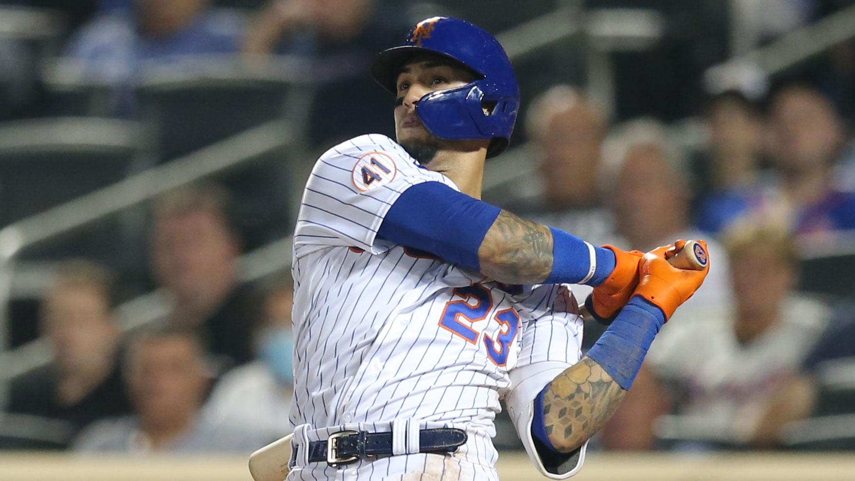 Sep 14, 2021; New York City, New York, USA; New York Mets second baseman Javier Baez (23) follows through on a game tying solo home run against the St. Louis Cardinals during the ninth inning at Citi Field. / Brad Penner-USA TODAY Sports