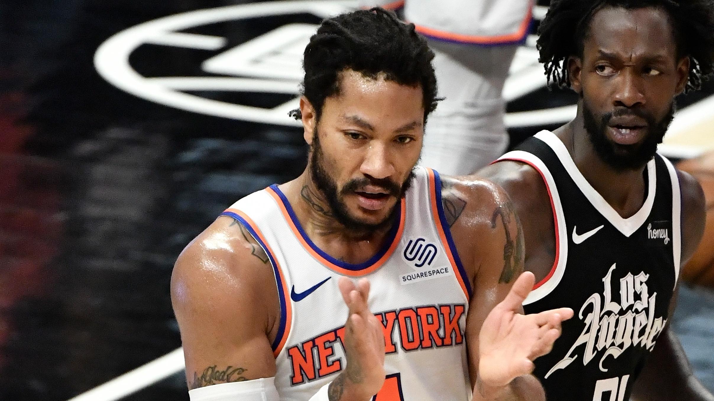 May 9, 2021; Los Angeles, California, USA; New York Knicks guard Derrick Rose (4) reacts to a referee's call going his way during the section quarter as LA Clippers guard Patrick Beverley (21) looks on at Staples Center. Mandatory Credit: Robert Hanashiro-USA TODAY Sports / © Robert Hanashiro-USA TODAY Sports