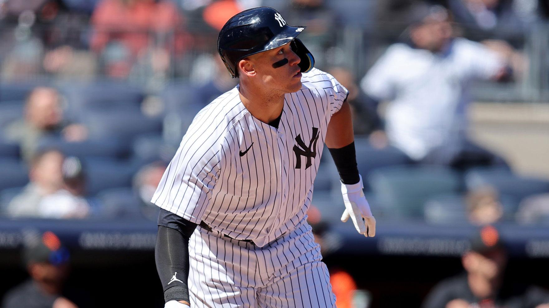 Mar 30, 2023; Bronx, New York, USA; New York Yankees center fielder Aaron Judge (99) watches his solo home run against the San Francisco Giants during the first inning at Yankee Stadium. / Brad Penner-USA TODAY Sports