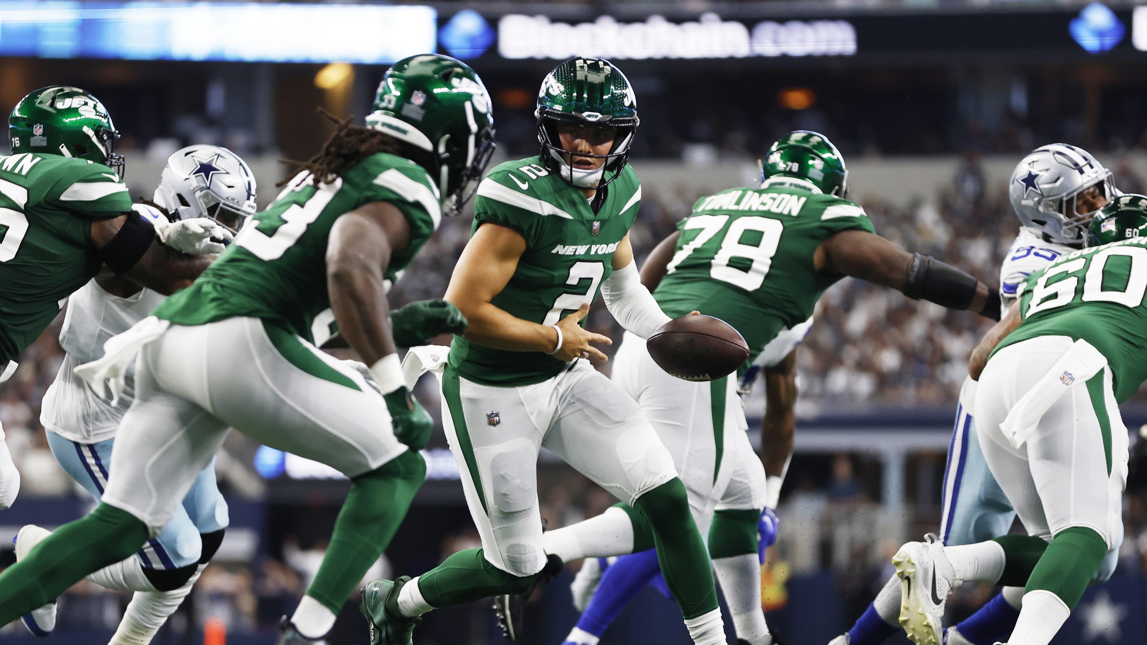Sep 17, 2023; Arlington, Texas, USA; New York Jets quarterback Zach Wilson (2) hands off to running back Dalvin Cook (33) in the third quarter against the Dallas Cowboys at AT&T Stadium. Mandatory Credit: Tim Heitman-USA TODAY Sports / © Tim Heitman-USA TODAY Sports