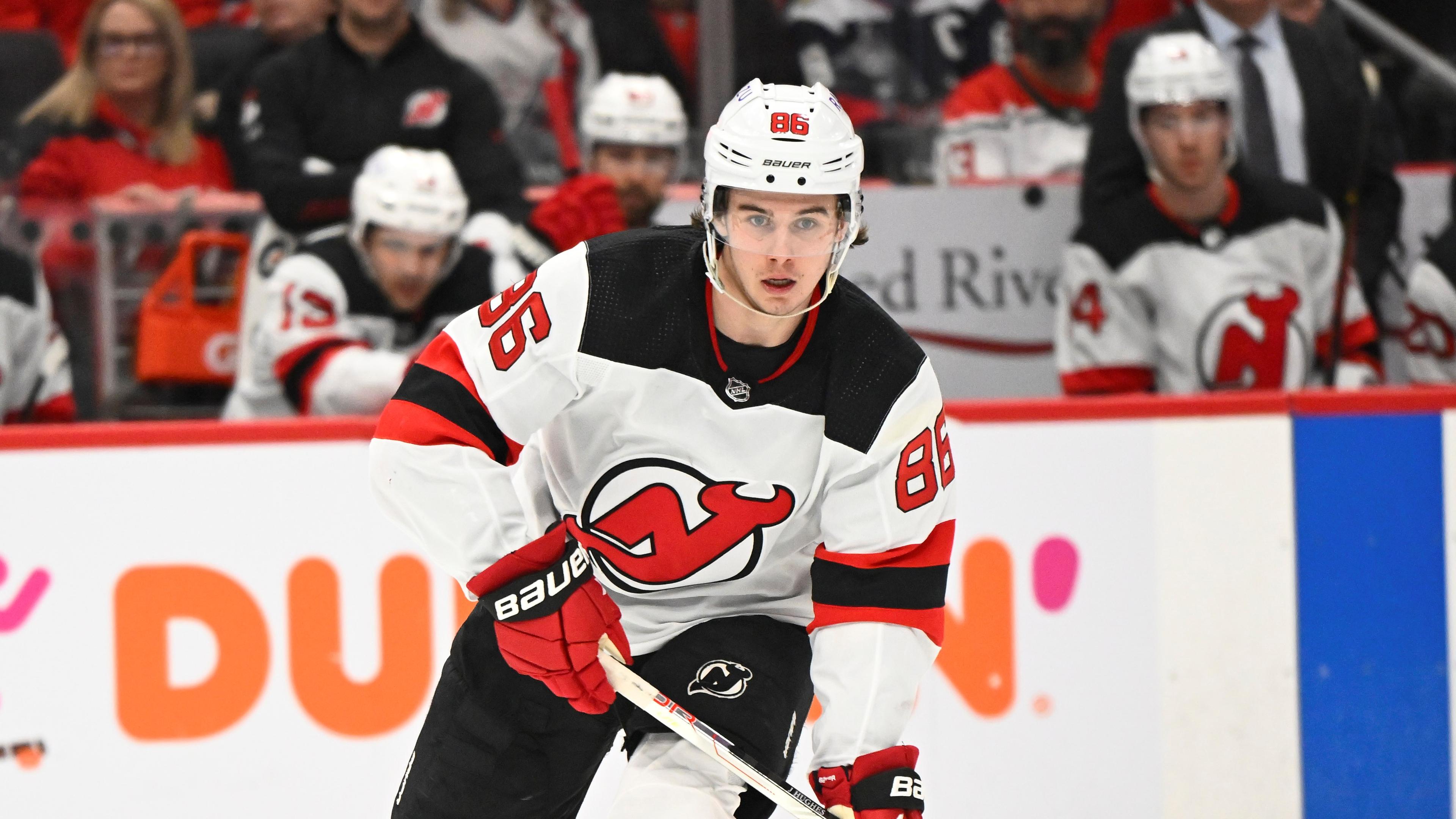 Mar 26, 2022; Washington, District of Columbia, USA; New Jersey Devils center Jack Hughes (86) handles the puck against the Washington Capitals during the second period at Capital One Arena. Mandatory Credit: Brad Mills-USA TODAY Sports / Brad Mills-USA TODAY Sports