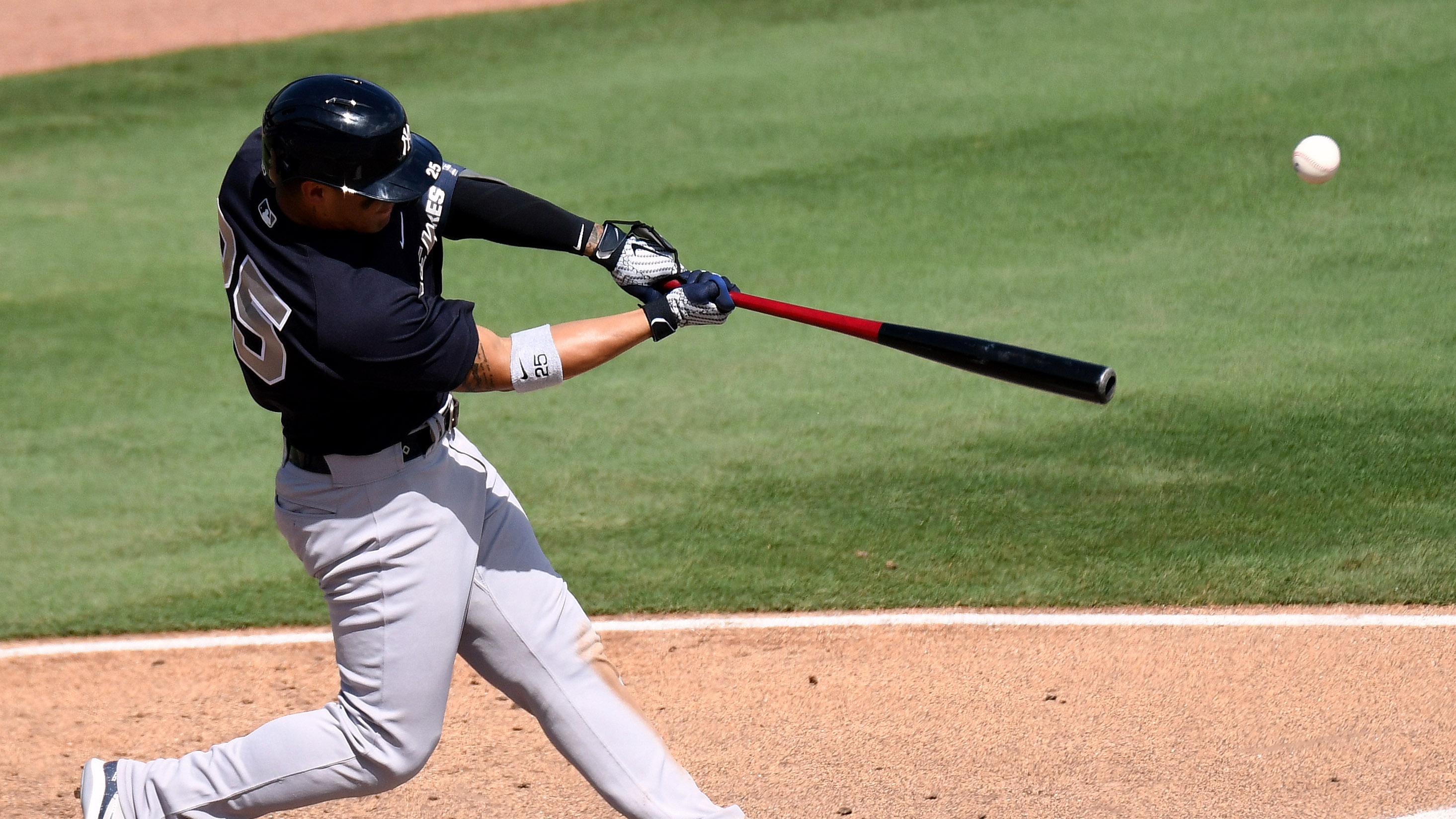 Gleyber Torres lines a base hit vs. Orioles in spring training / Jonathan Dyer/USA TODAY