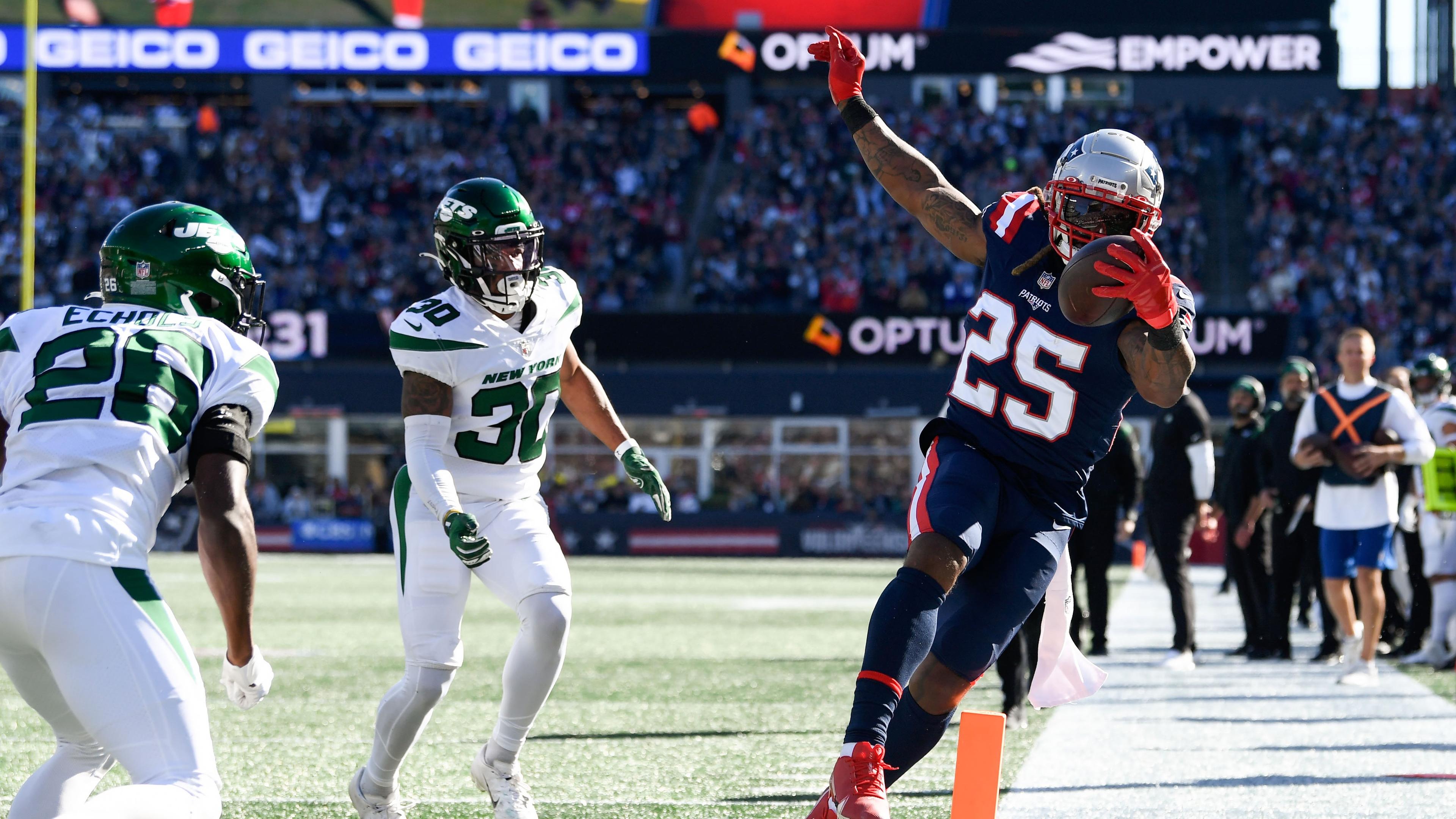 Oct 24, 2021; Foxborough, Massachusetts, USA; New England Patriots running back Brandon Bolden (25) scores a touchdown against the New York Jets during the first half at Gillette Stadium. Mandatory Credit: Brian Fluharty-USA TODAY Sports / Brian Fluharty-USA TODAY Sports