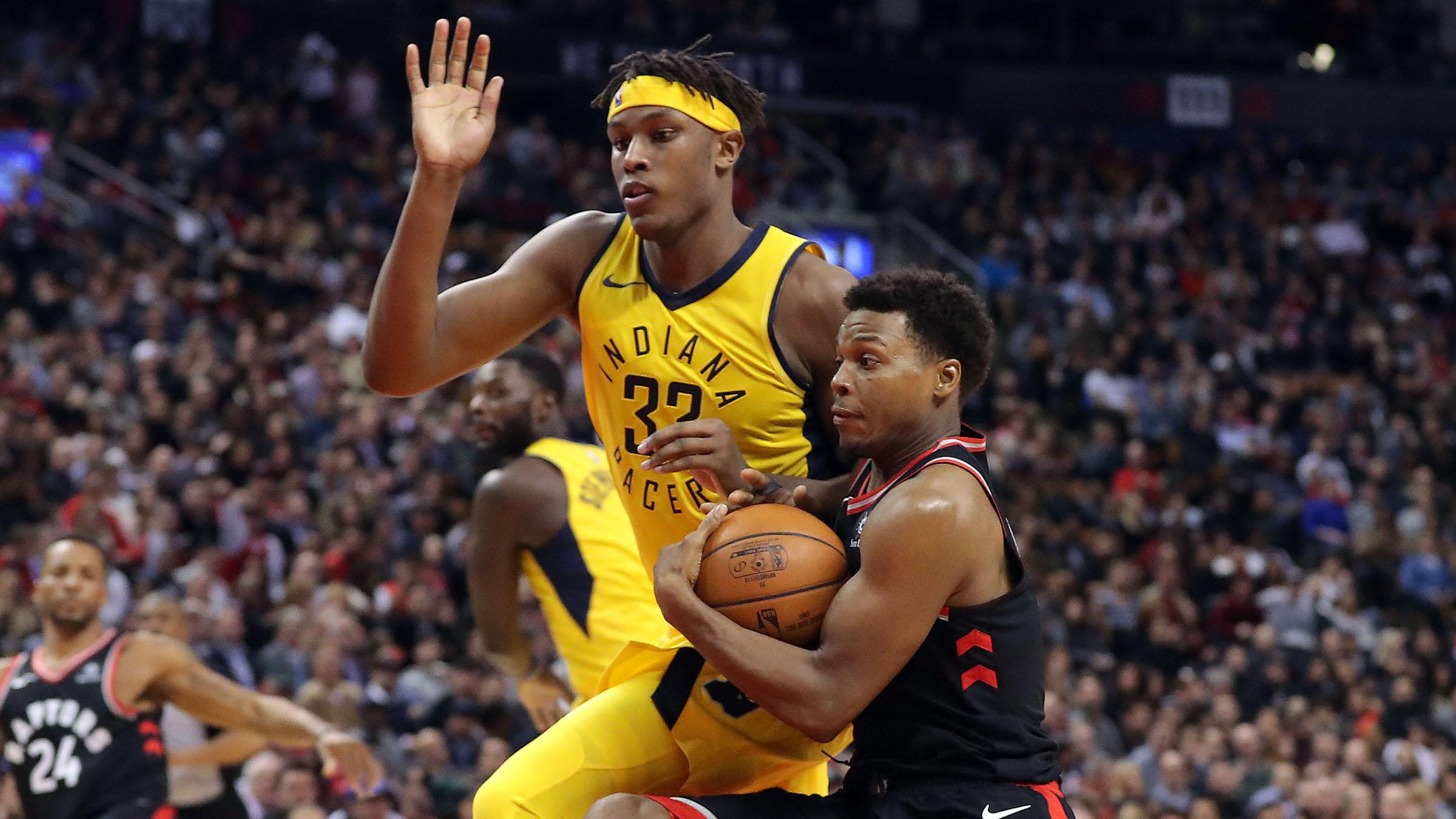 Toronto Raptors point guard Kyle Lowry (7) drives to the basket against Indiana Pacers forward Myles Turner (33) at Air Canada Centre. The Raptors beat the Pacers 120-115. / Tom Szczerbowski-USA TODAY Sports