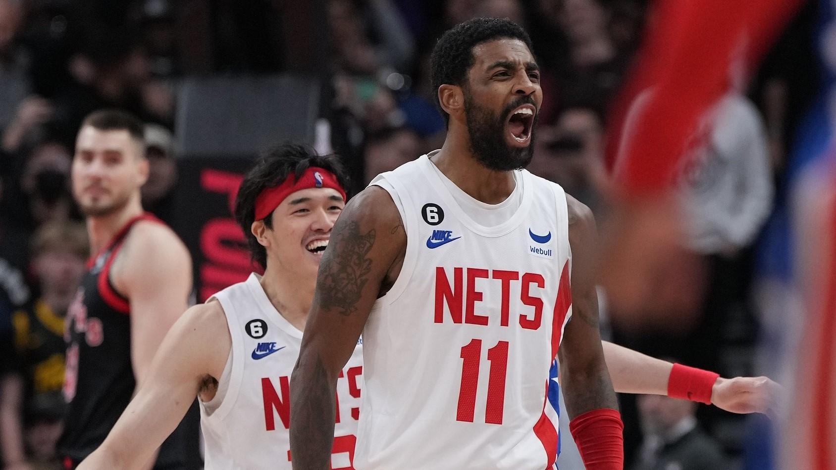 Dec 16, 2022; Toronto, Ontario, CAN; Brooklyn Nets guard Kyrie Irving (11) celebrates after shooting the winning basket against the Toronto Raptors during the fourth quarter at the Scotiabank Arena. / Nick Turchiaro-USA TODAY Sports