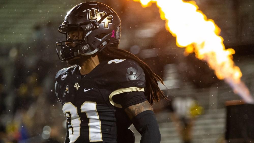 Oct 3, 2020; Orlando, Florida, USA; UCF Knights defensive back Aaron Robinson (31) runs out of the tunnel during team introductions before a game against the Tulsa Golden Hurricane at Spectrum Stadium. / Mary Holt-USA TODAY Sports