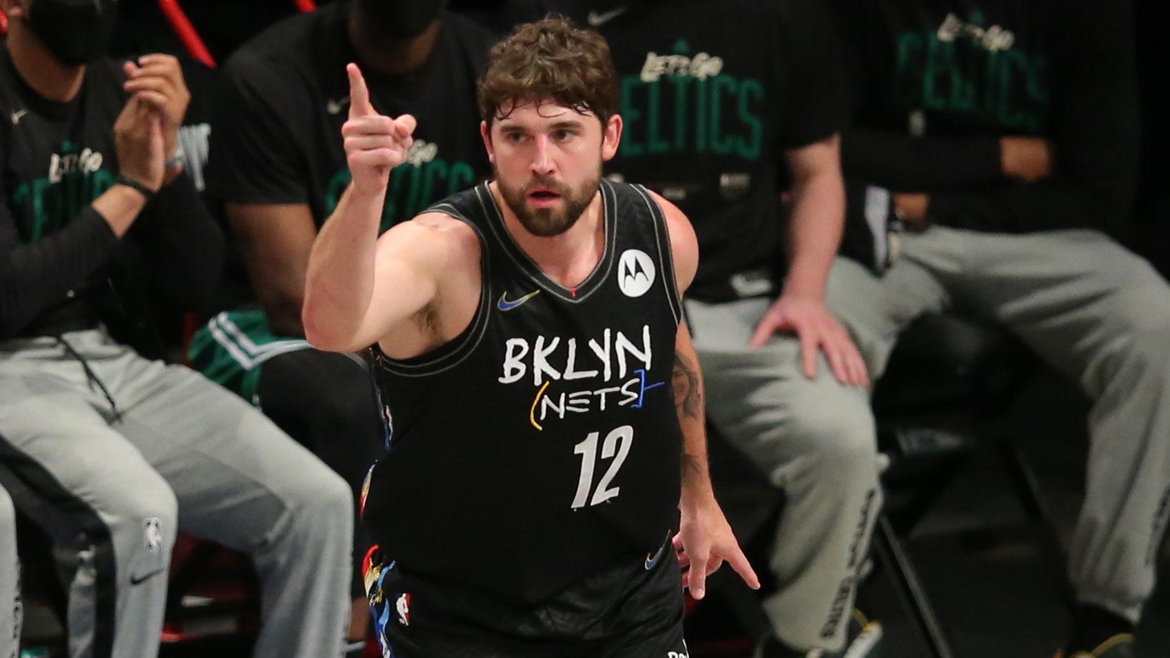 May 25, 2021; Brooklyn, New York, USA; Brooklyn Nets small forward Joe Harris (12) reacts after a three point shot against the Boston Celtics during the first quarter of game two of the first round of the 2021 NBA Playoffs at Barclays Center. / Brad Penner-USA TODAY Sports