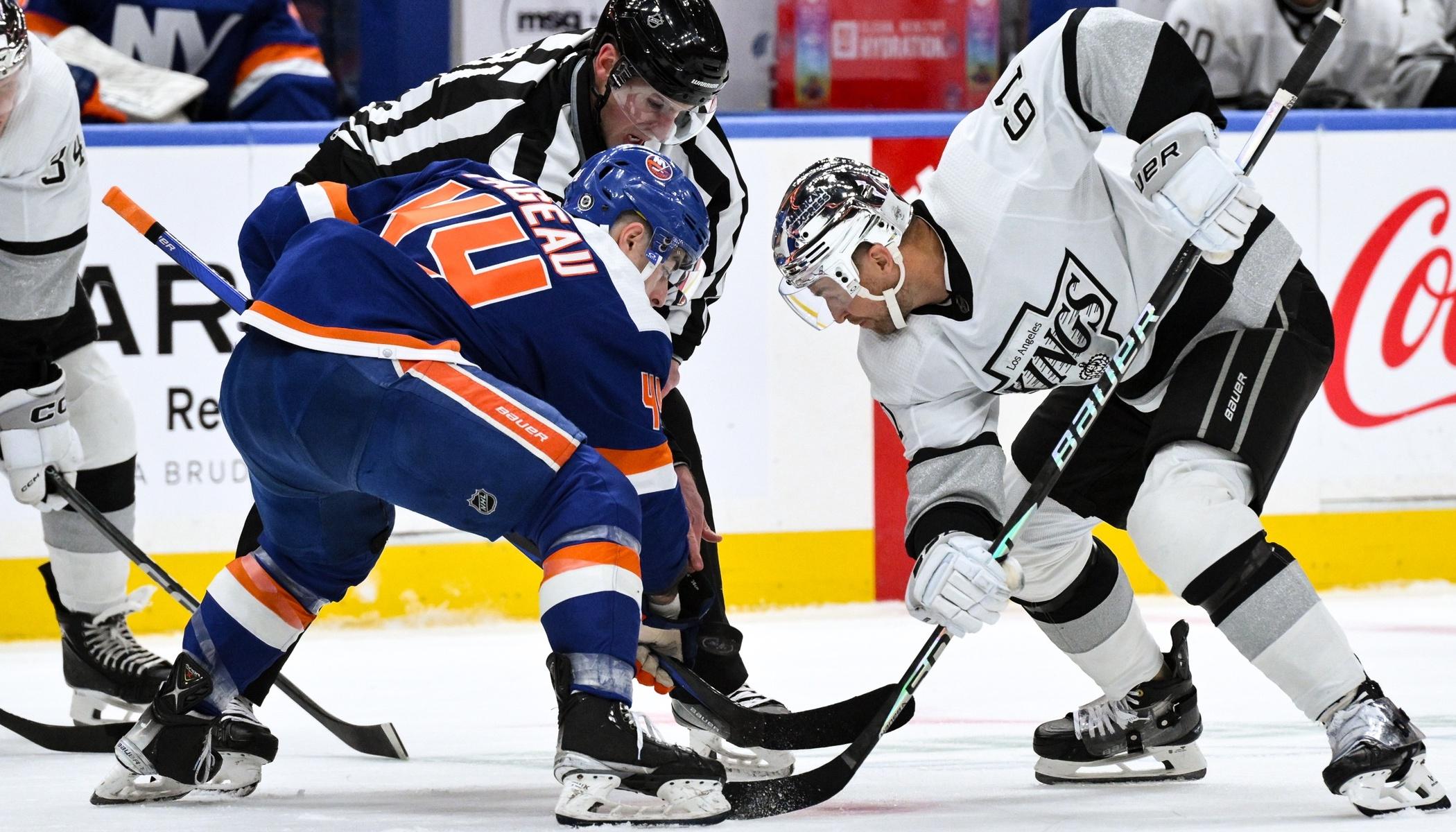 New York Islanders center Jean-Gabriel Pageau (44) faces off against Los Angeles Kings center Trevor Lewis (61) during the first period at UBS Arena. / John Jones-USA TODAY Sports