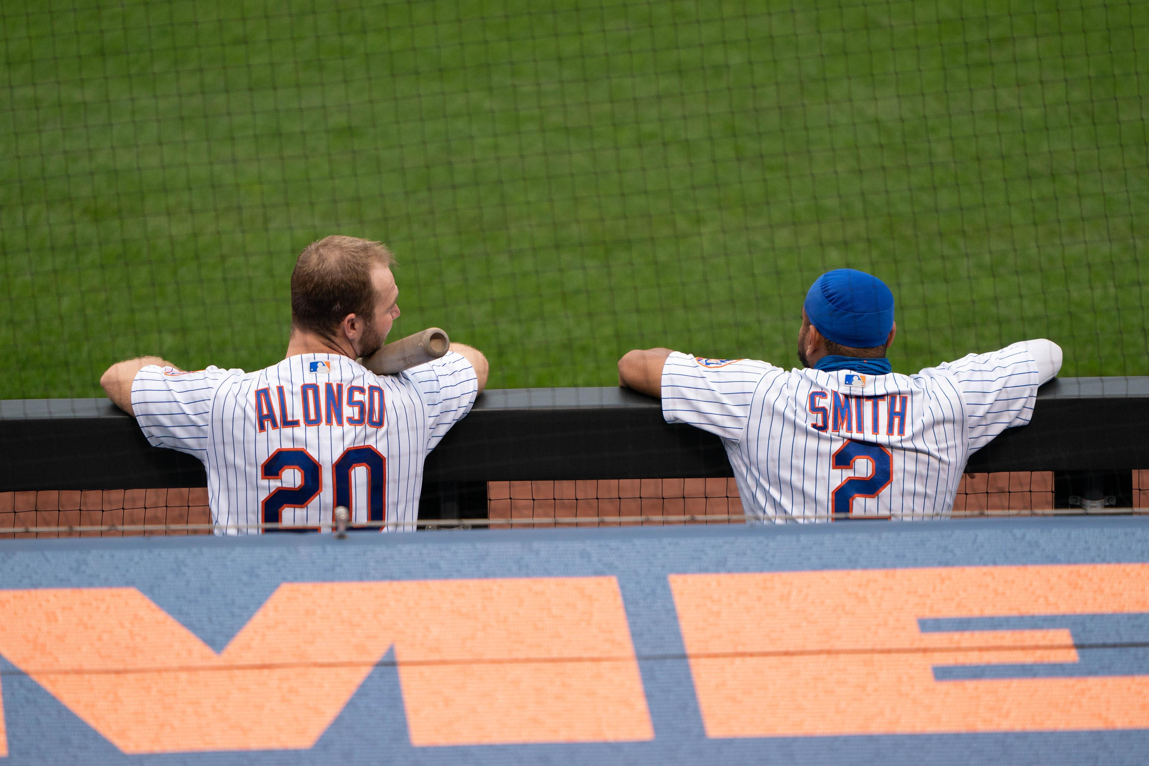 Sep 3, 2020; New York City, New York, USA; New York Mets first baseman Pete Alonso (20) and New York Mets left fielder Dominic Smith (2) look on from the dugout during the fourth inning against the New York Yankees at Citi Field. / Gregory Fisher-USA TODAY Sports