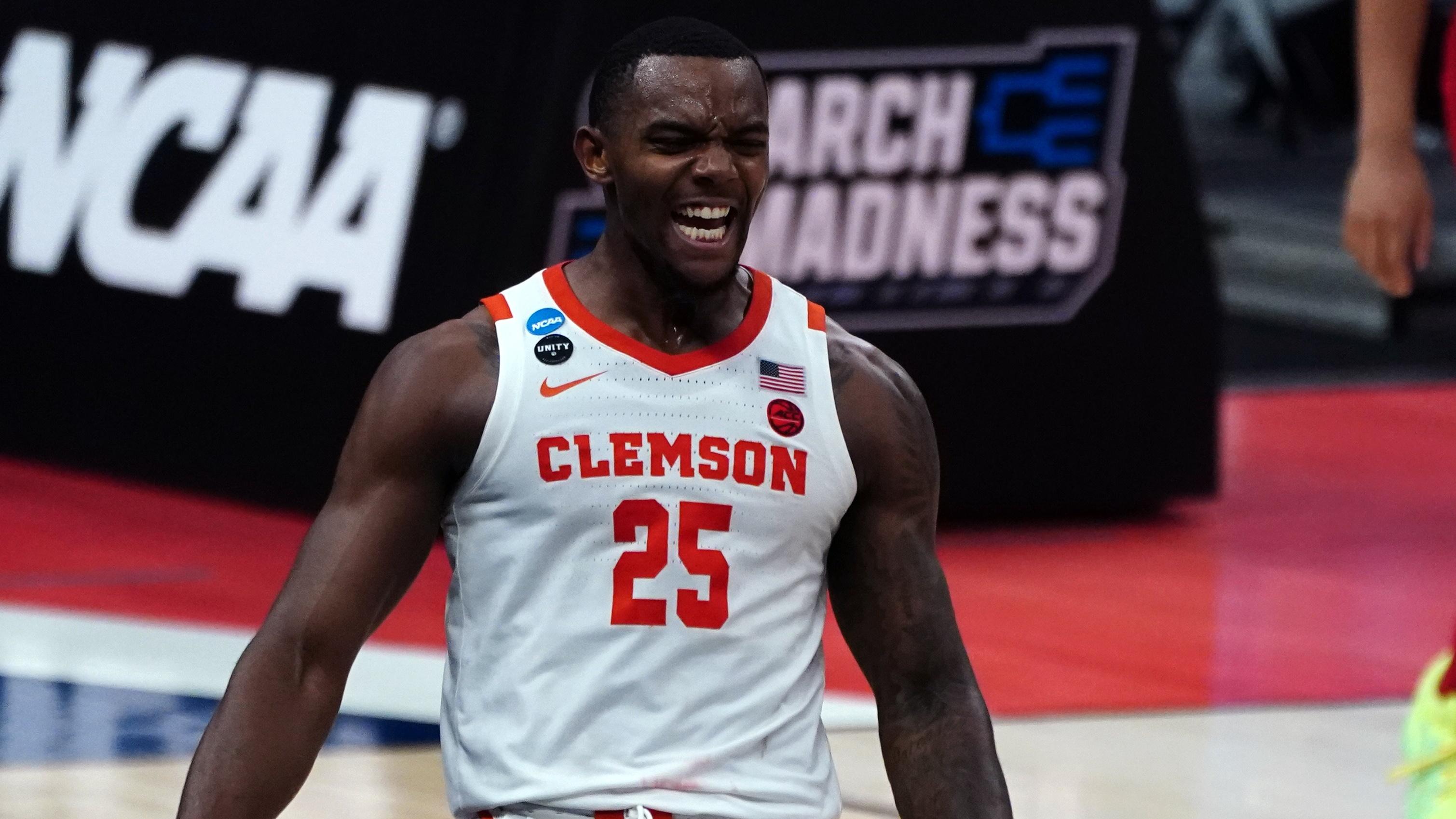 Mar 19, 2021; Indianapolis, Indiana, USA; Clemson Tigers forward Aamir Simms (25) reacts during the second half against the Rutgers Scarlet Knights in the first round of the 2021 NCAA Tournament at Bankers Life Fieldhouse. / © Kirby Lee-USA TODAY Sports