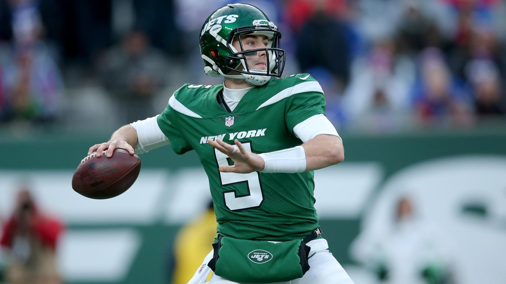 Nov 14, 2021; East Rutherford, New Jersey, USA; New York Jets quarterback Mike White (5) drops back to pass. against the Buffalo Bills during the fourth quarter at MetLife Stadium. / Brad Penner-USA TODAY Sports