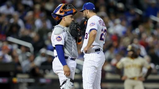 New York Mets catcher Francisco Alvarez (4) talks to starting pitcher David Peterson (23) during the fifth inning against the San Diego Padres at Citi Field / Rich Storry - USA TODAY Sports