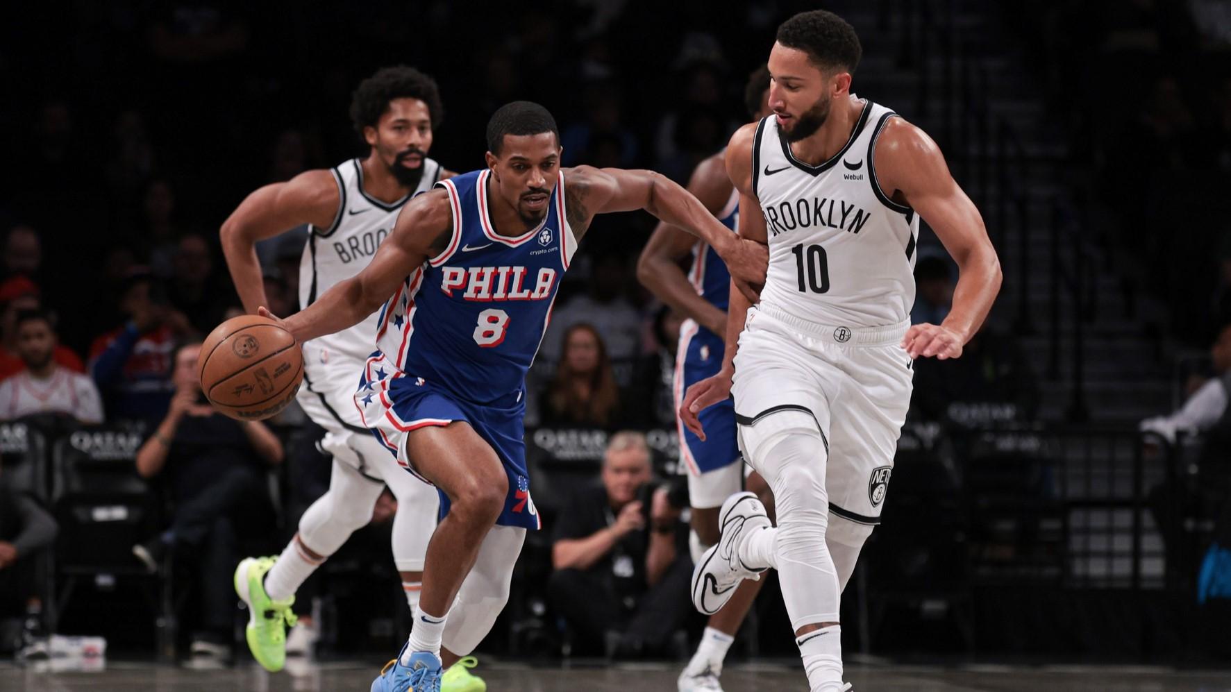 Oct 16, 2023; Brooklyn, New York, USA; Philadelphia 76ers guard De'Anthony Melton (8) dribbles up court against Brooklyn Nets guard Ben Simmons (10) during the first quarter at Barclays Center. / Vincent Carchietta-USA TODAY Sports