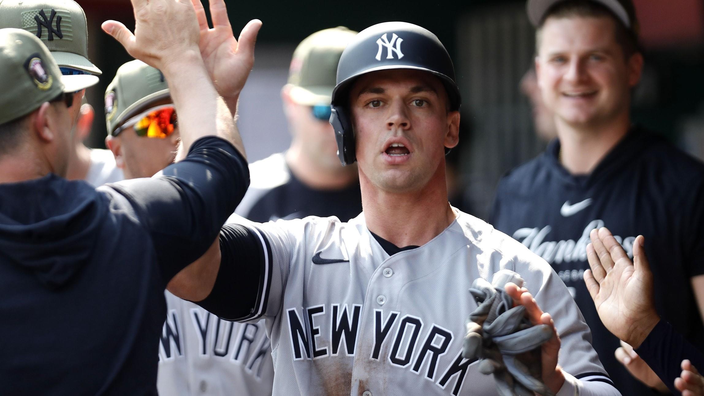 May 20, 2023; Cincinnati, Ohio, USA; New York Yankees catcher Ben Rortvedt (38) reacts in the dugout after scoring against the Cincinnati Reds during the third inning at Great American Ball Park. / David Kohl-USA TODAY Sports