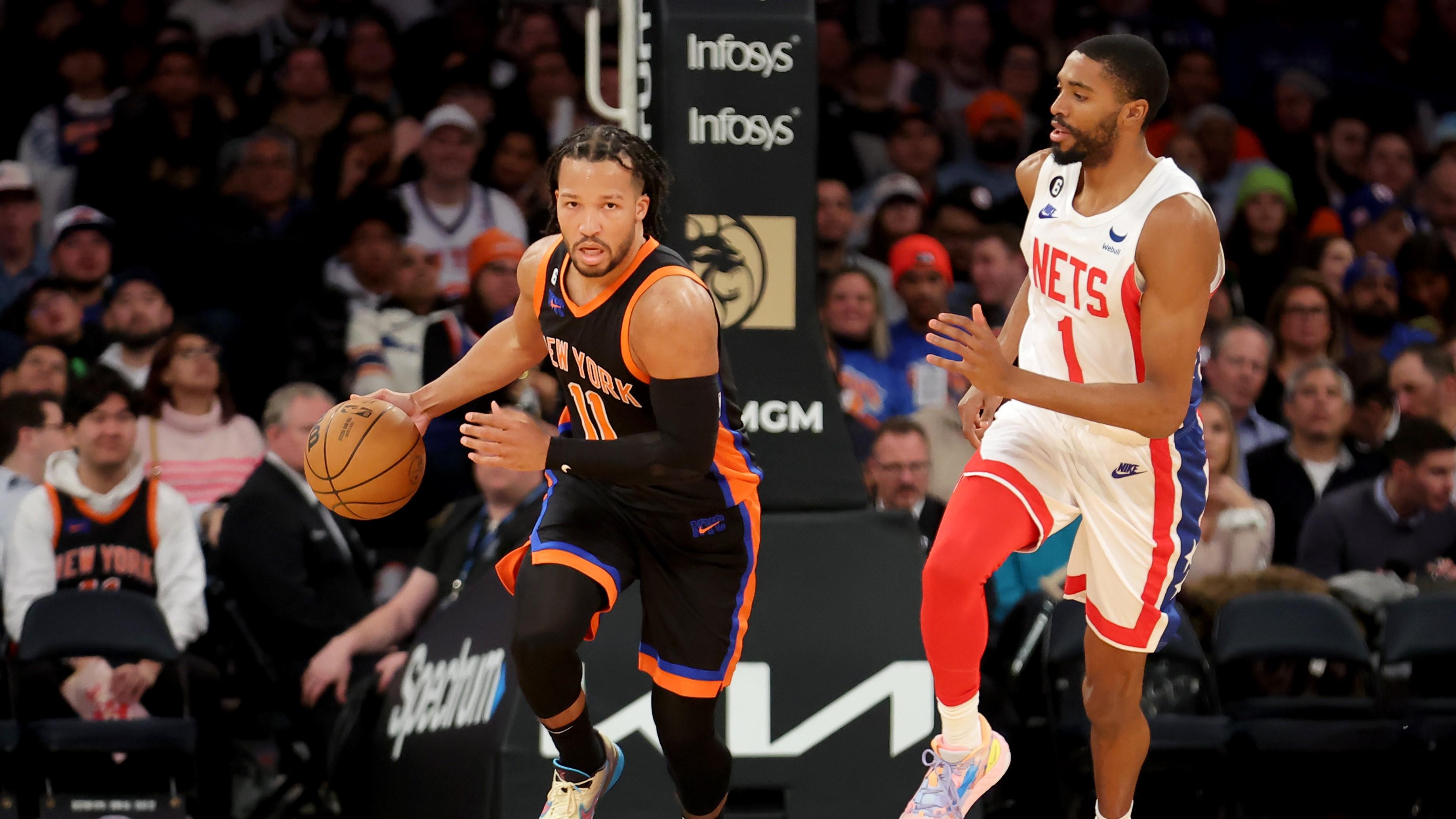 Mar 1, 2023; New York, New York, USA; New York Knicks guard Jalen Brunson (11) brings the ball up court against Brooklyn Nets forward Mikal Bridges (1) during the third quarter at Madison Square Garden. Mandatory Credit: Brad Penner-USA TODAY Sports / © Brad Penner-USA TODAY Sports