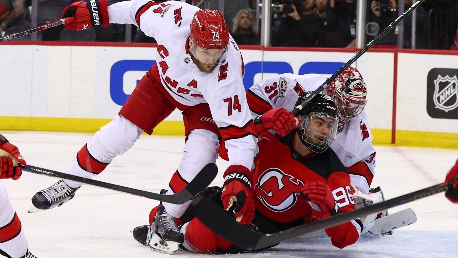 New Jersey Devils right wing Timo Meier (96) collides with Carolina Hurricanes goaltender Frederik Andersen (31) during the second period in game four of the second round of the 2023 Stanley Cup Playoffs. / Ed Mulholland-USA TODAY Sports