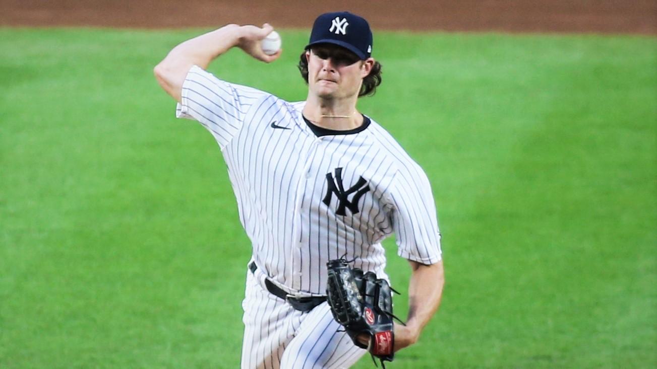 Aug 31, 2020; Bronx, New York, USA; New York Yankees pitcher Gerrit Cole (45) pitches against the Tampa Bay Rays in the first inning at Yankee Stadium. / © Wendell Cruz-USA TODAY Sports