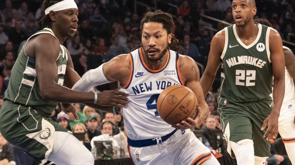 Dec 12, 2021; New York, New York, USA; New York Knicks point guard Derrick Rose (4) dribbles the ball against Milwaukee Bucks center Bobby Portis (9) during the first half at Madison Square Garden. / Gregory Fisher-USA TODAY Sports