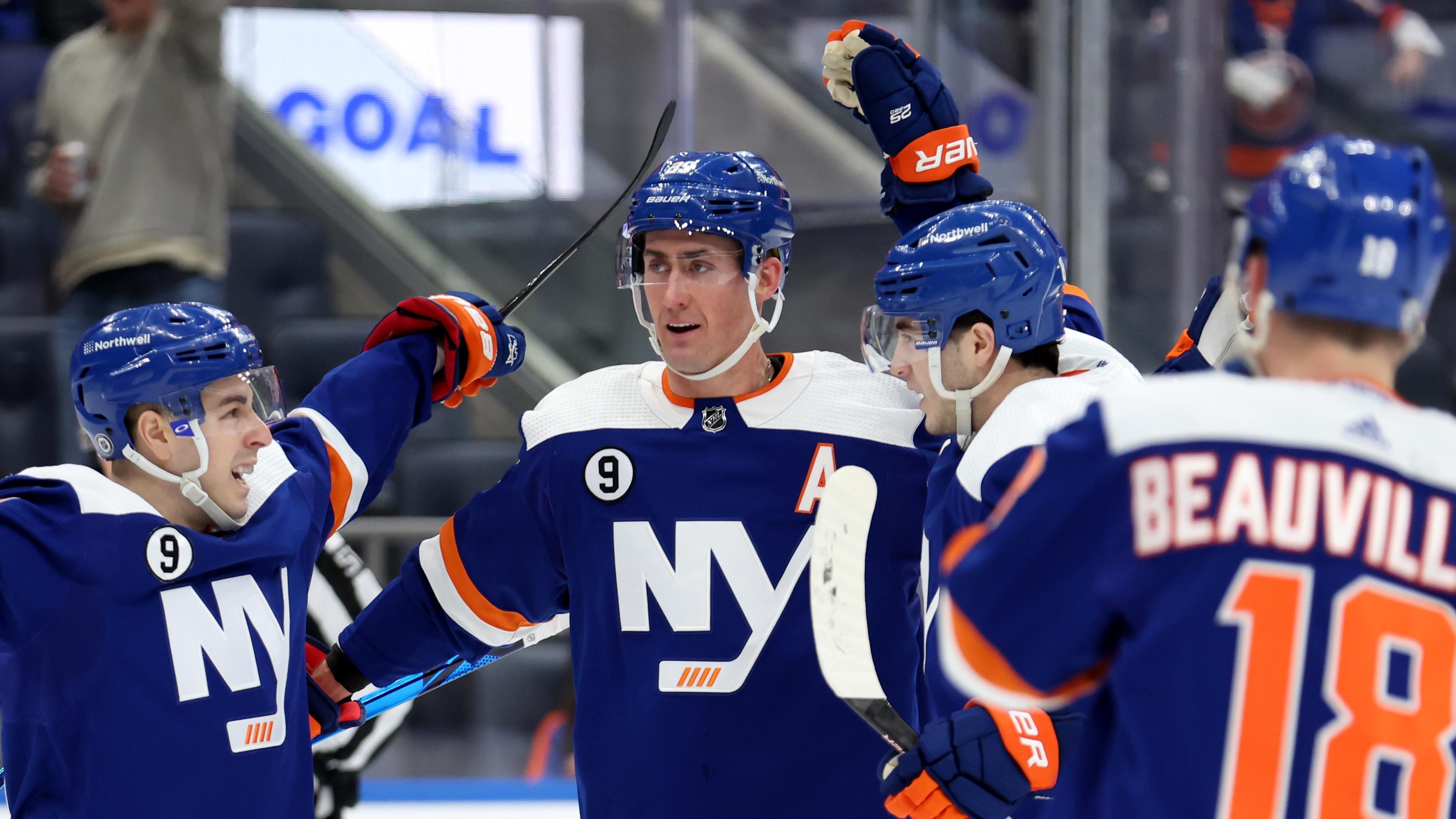 Mar 5, 2022; Elmont, New York, USA; New York Islanders center Brock Nelson (29) celebrates his goal against the St. Louis Blues with teammates during the second period at UBS Arena. Mandatory Credit: Brad Penner-USA TODAY Sports / © Brad Penner-USA TODAY Sports