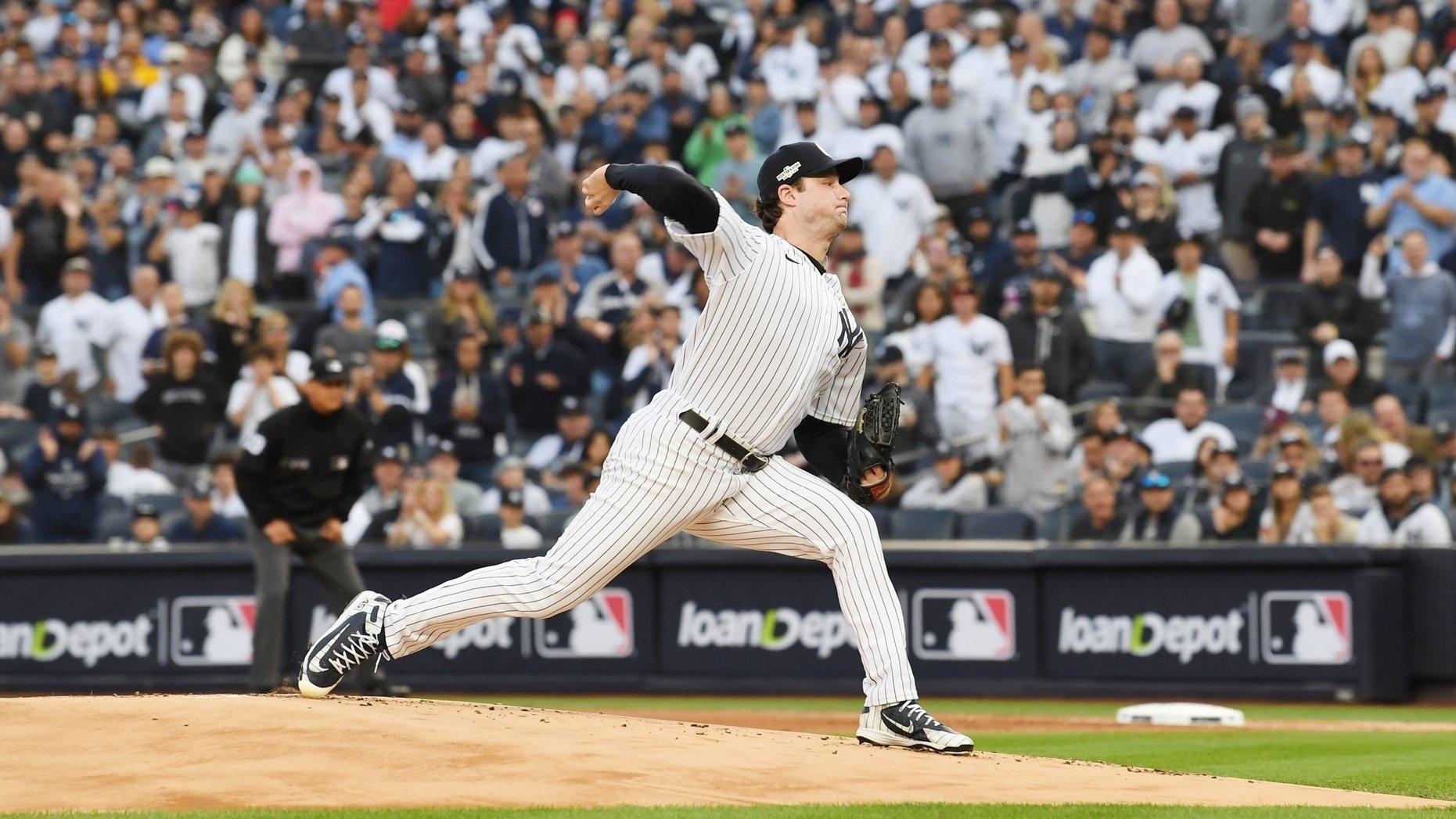 New York Yankees starting pitcher Gerrit Cole pitches in the first inning against the Houston Astros during Game 3 of the ALCS. / Dennis Schneidler-USA TODAY Sports