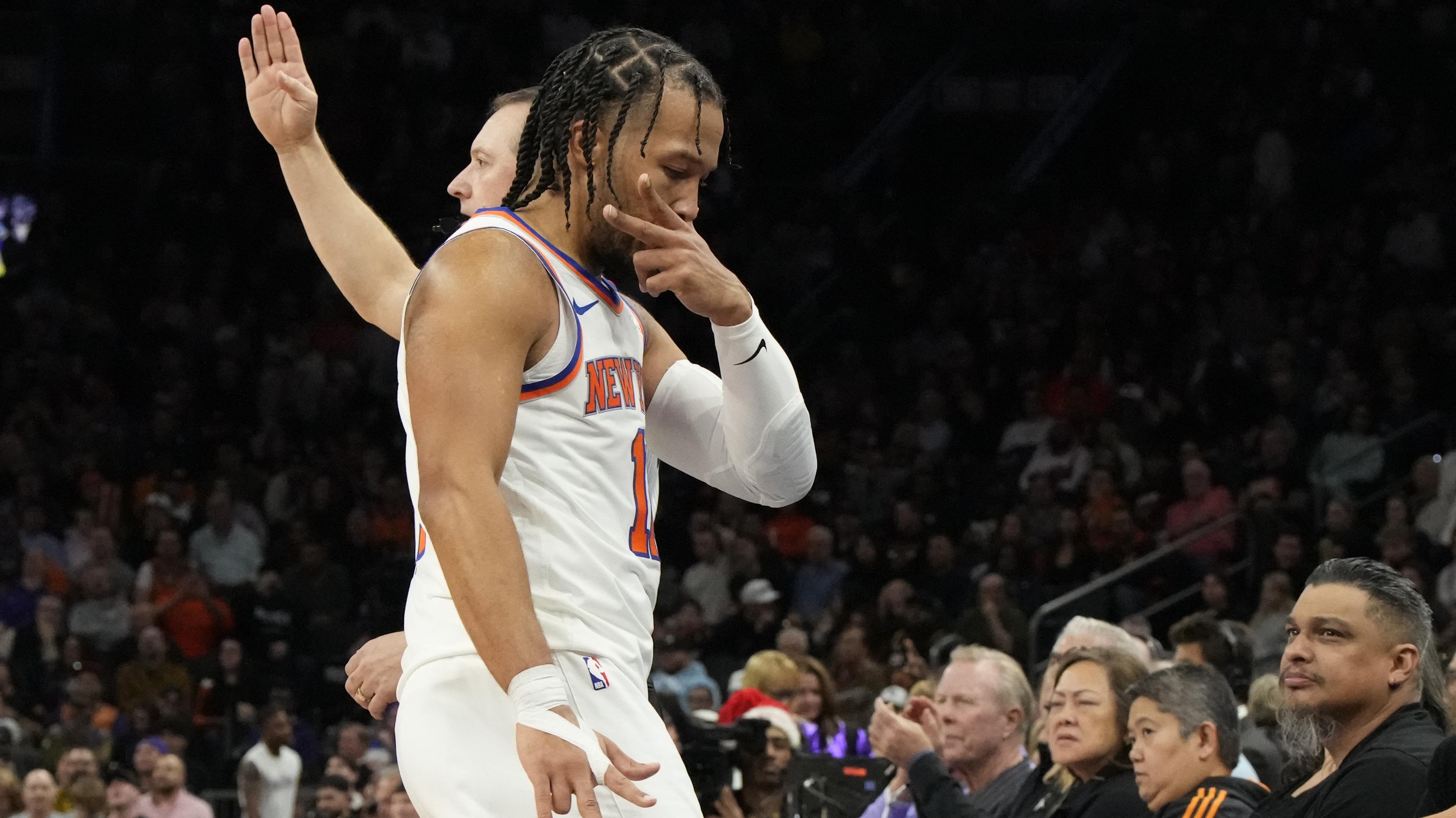 New York Knicks guard Jalen Brunson (11) reacts after scoring against the Phoenix Suns in the second half at Footprint Center / Rick Scuteri - USA TODAY Sports