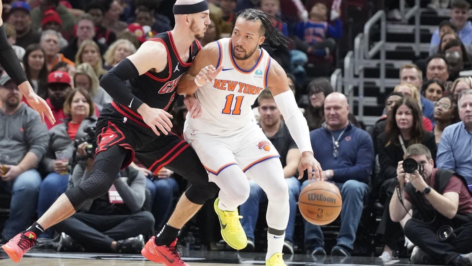 Apr 5, 2024; Chicago, Illinois, USA; Chicago Bulls guard Alex Caruso (6) defends New York Knicks guard Jalen Brunson (11) during the first quarter at United Center. / David Banks-USA TODAY Sports