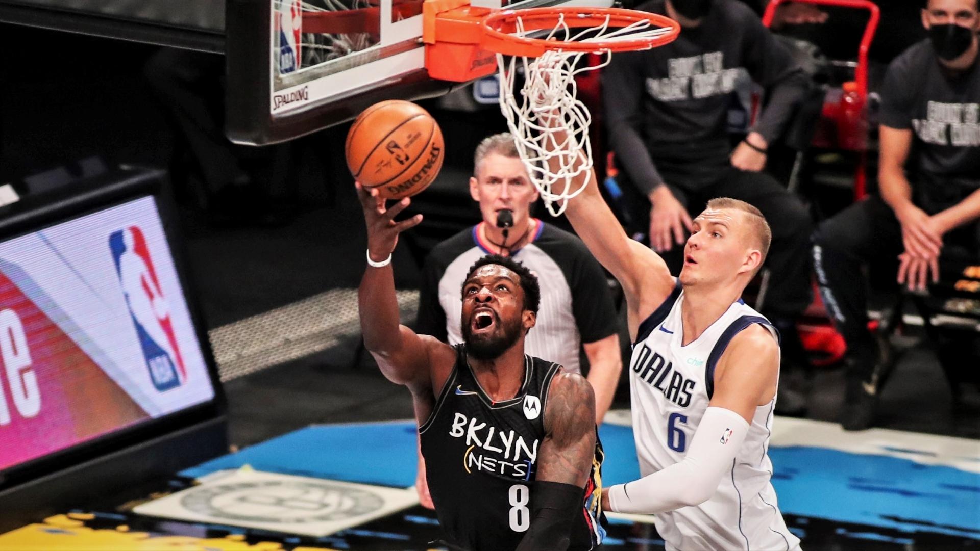 Feb 27, 2021; Brooklyn, New York, USA; Brooklyn Nets forward Jeff Green (8) drives in for a reverse layup in the first quarter against the Dallas Mavericks at Barclays Center. Mandatory Credit: Wendell Cruz-USA TODAY Sports / © Wendell Cruz-USA TODAY Sports
