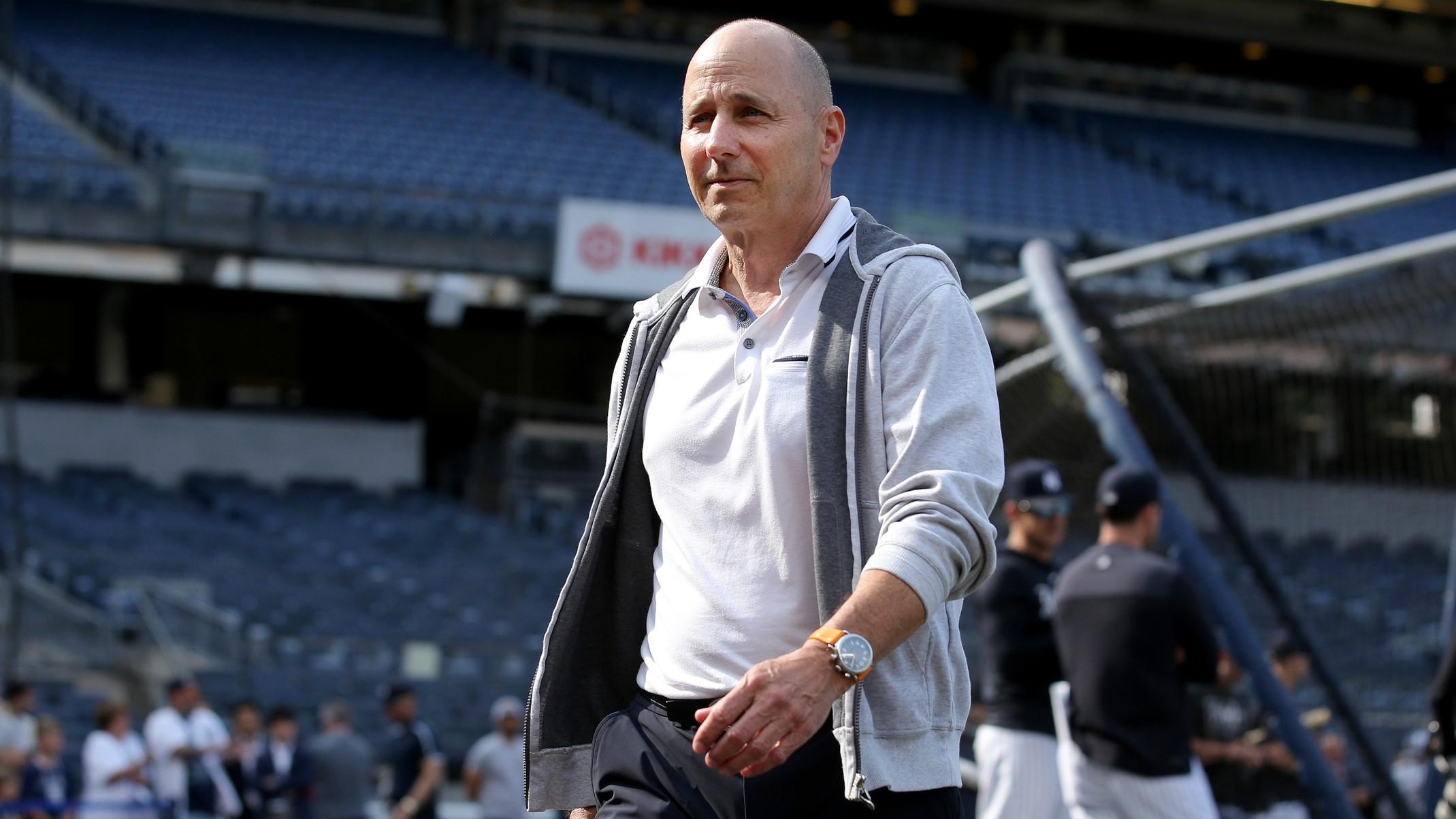 Jun 20, 2023; Bronx, New York, USA; New York Yankees general manager Brian Cashman on the field during batting practice before a game against the Seattle Mariners at Yankee Stadium. / Brad Penner-USA TODAY Sports