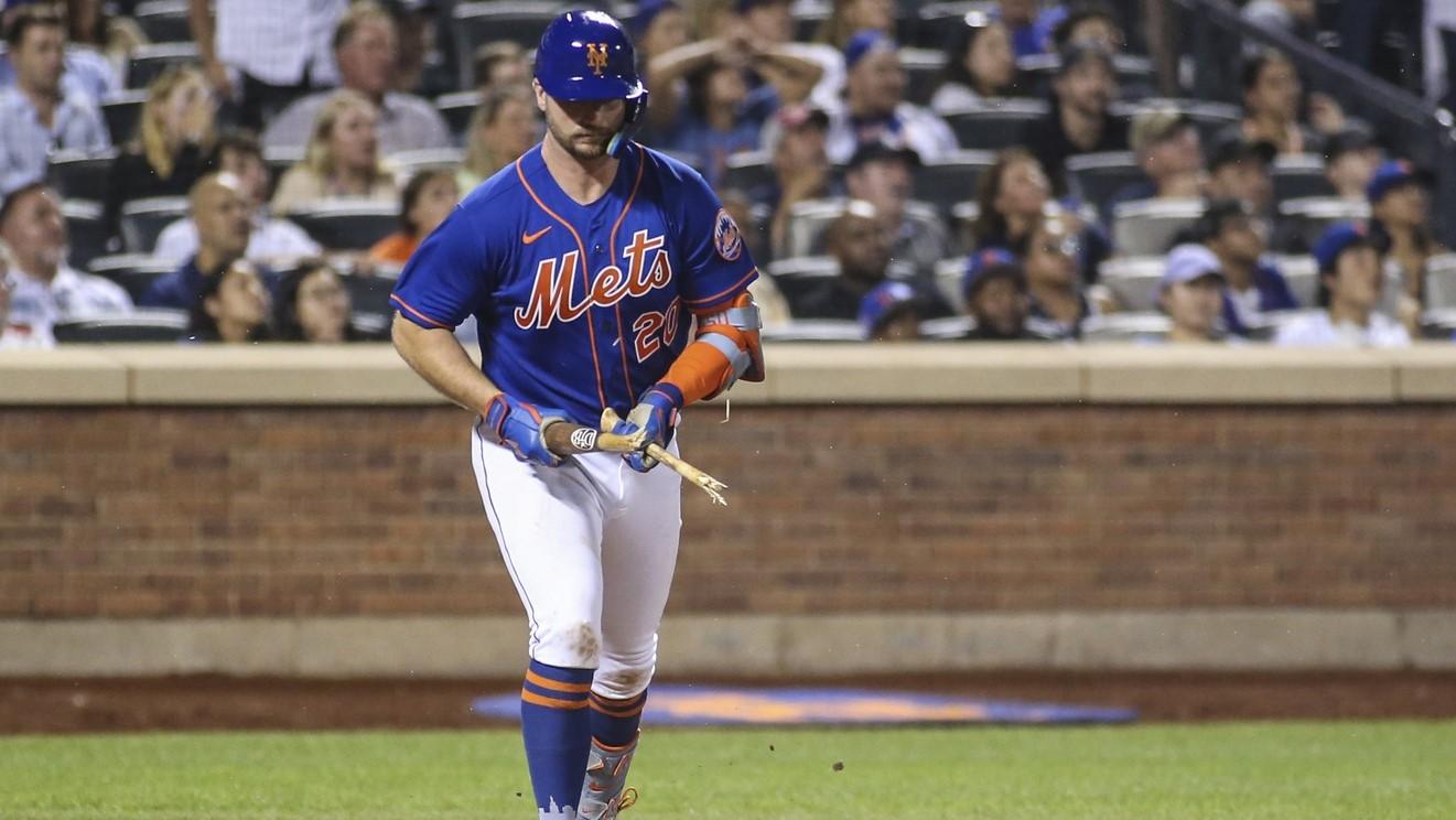 Aug 30, 2022; New York City, New York, USA; New York Mets first baseman Pete Alonso (20) breaks his bat over his knee after flying out to end the seventh inning against the Los Angeles Dodgers at Citi Field. / Wendell Cruz-USA TODAY Sports