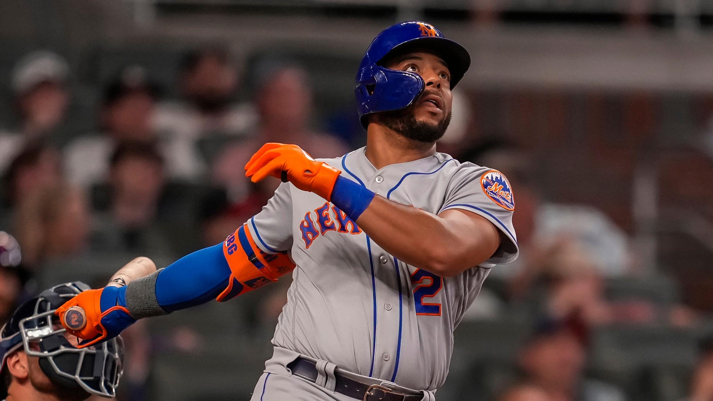 Jul 1, 2021; Cumberland, Georgia, USA; New York Mets left fielder Dominic Smith (2) hits a solo home run against the Atlanta Braves during the ninth inning at Truist Park. / Mandatory Credit: Dale Zanine-USA TODAY Sports