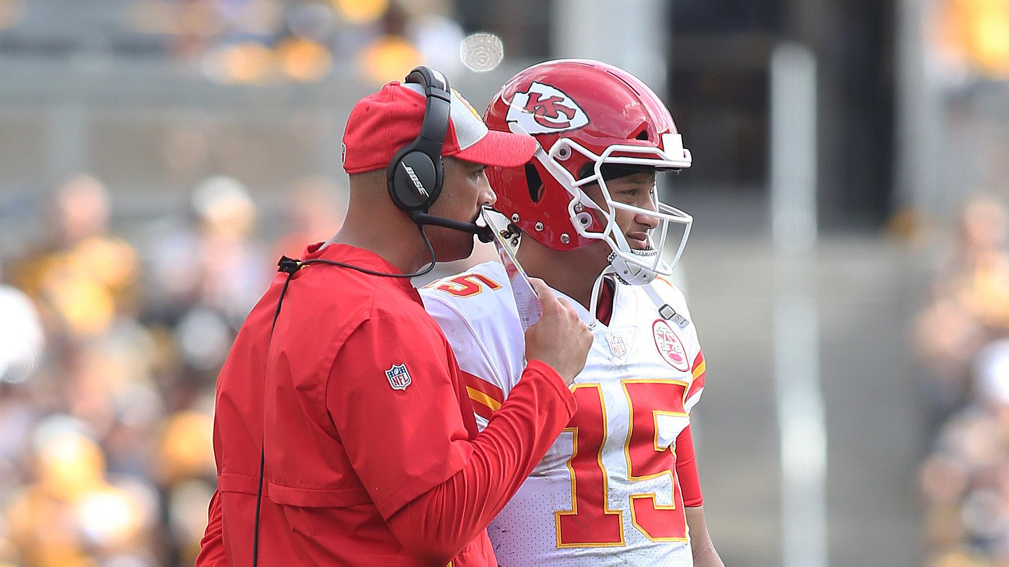 Kansas City Chiefs quarterbacks coach Mike Kafka (L) talks with quarterback Patrick Mahomes (15) against the Pittsburgh Steelers during the third quarter at Heinz Field. The Chiefs won 42-37. / Charles LeClaire-USA TODAY Sports