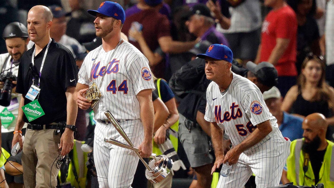 Jul 12, 2021; Denver, CO, USA; New York Mets first baseman Pete Alonso with bench coach Dave Jauss following his victory in the 2021 MLB Home Run Derby. / Isaiah J. Downing-USA TODAY Sports