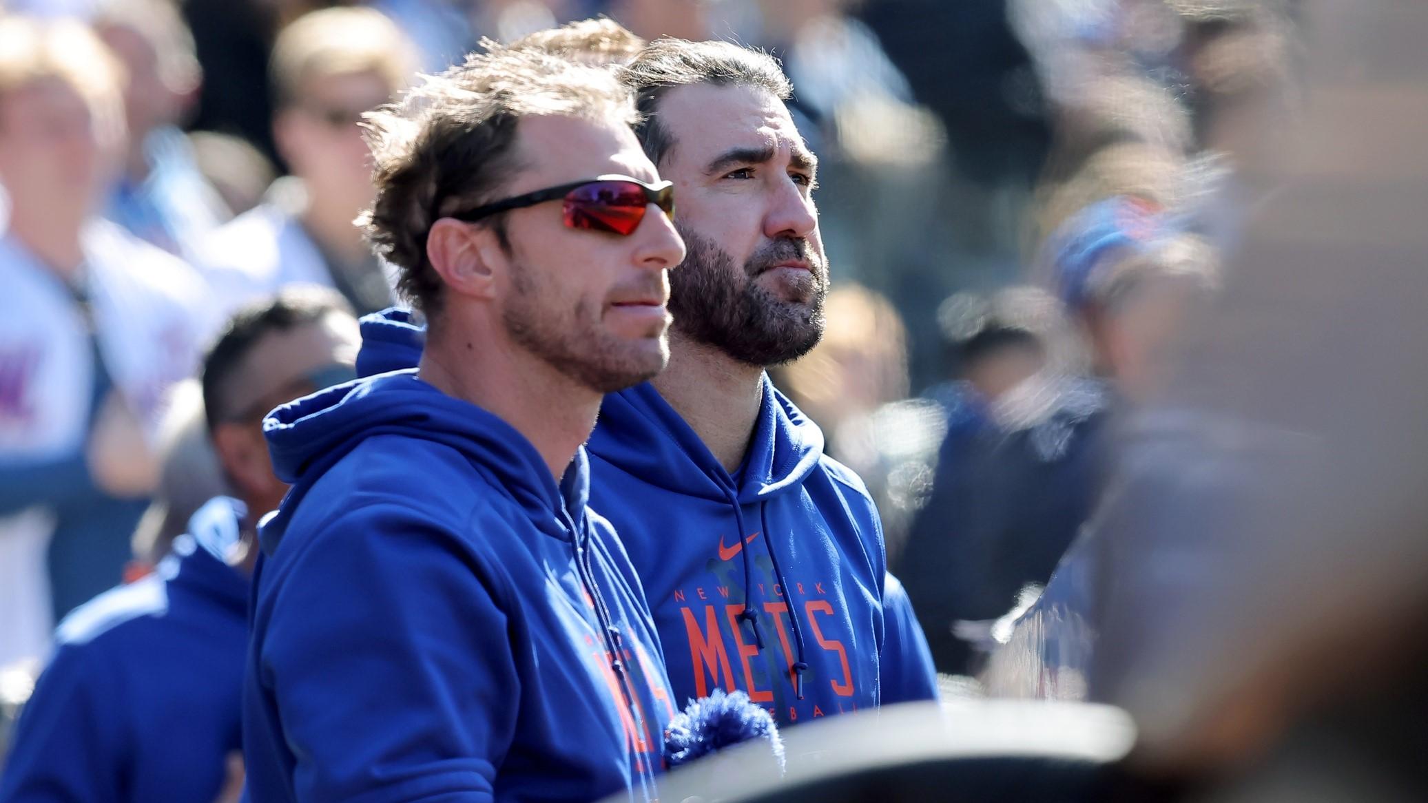 Apr 9, 2023; New York City, New York, USA; New York Mets starting pitchers Max Scherzer (left) and Justin Verlander stand together in the dugout during the seventh inning against the Miami Marlins at Citi Field. / Brad Penner-USA TODAY Sports
