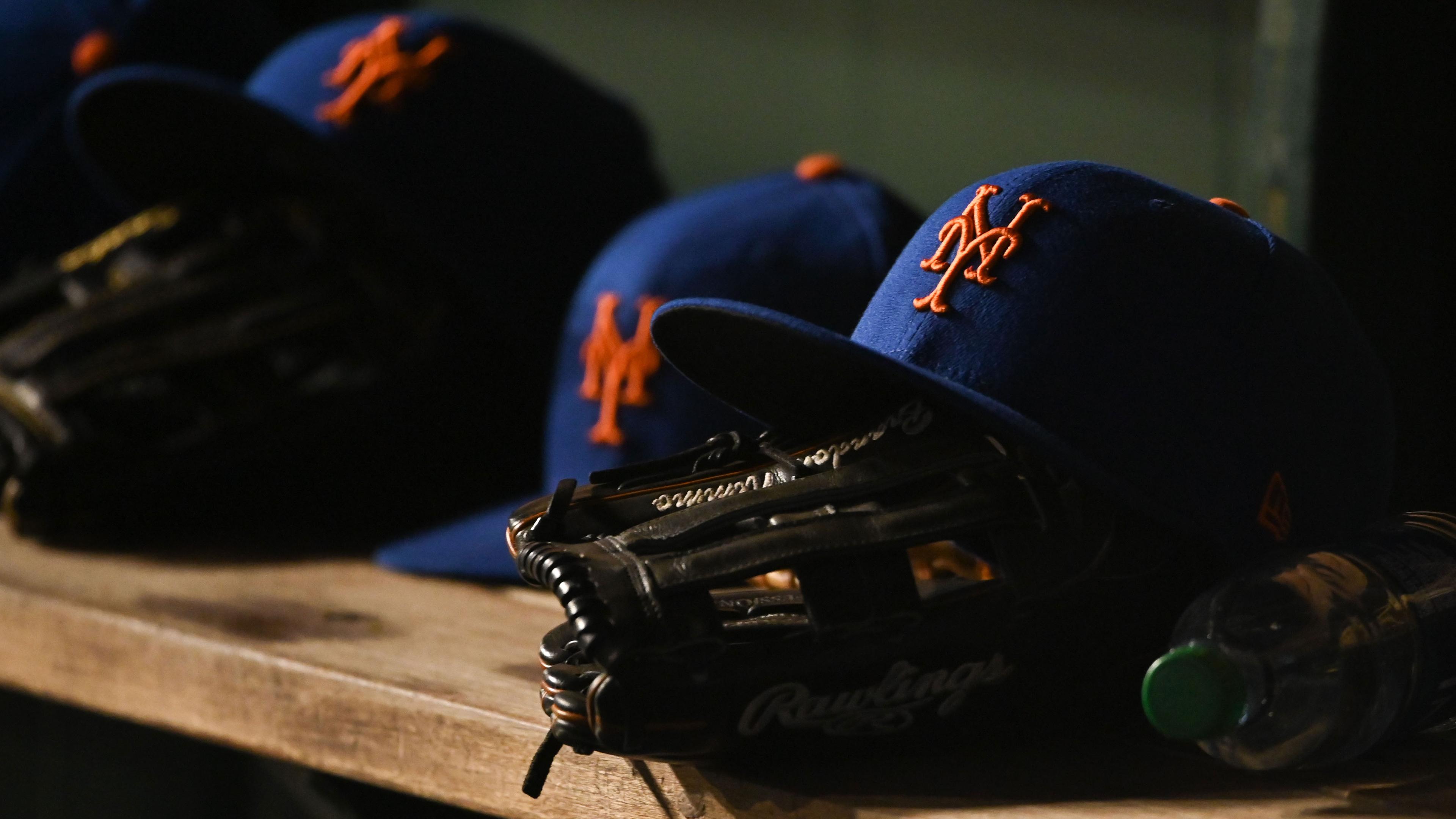 Apr 8, 2022; Washington, District of Columbia, USA; A detail view of New York Mets hats and gloves during the game between the Washington Nationals and the New York Mets at Nationals Park. / Tommy Gilligan-USA TODAY Sports