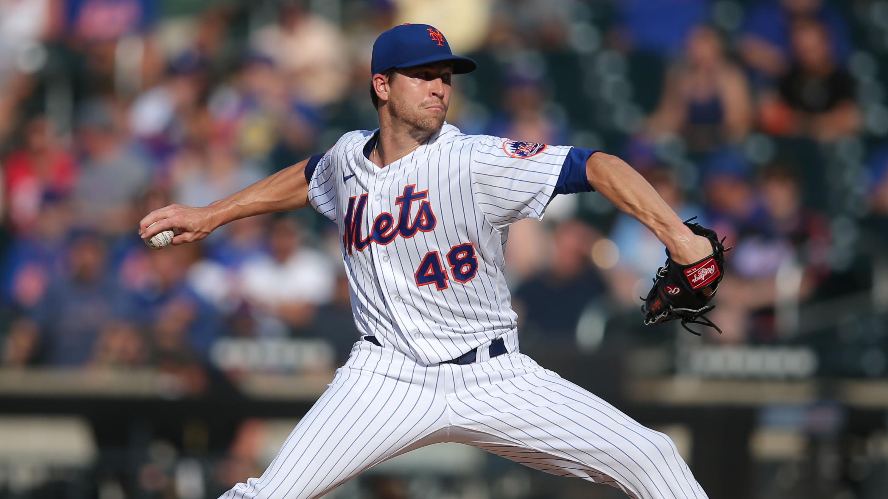 Jun 21, 2021; New York City, New York, USA; New York Mets starting pitcher Jacob deGrom (48) pitches against the Atlanta Braves during the third inning at Citi Field. / Brad Penner-USA TODAY Sports