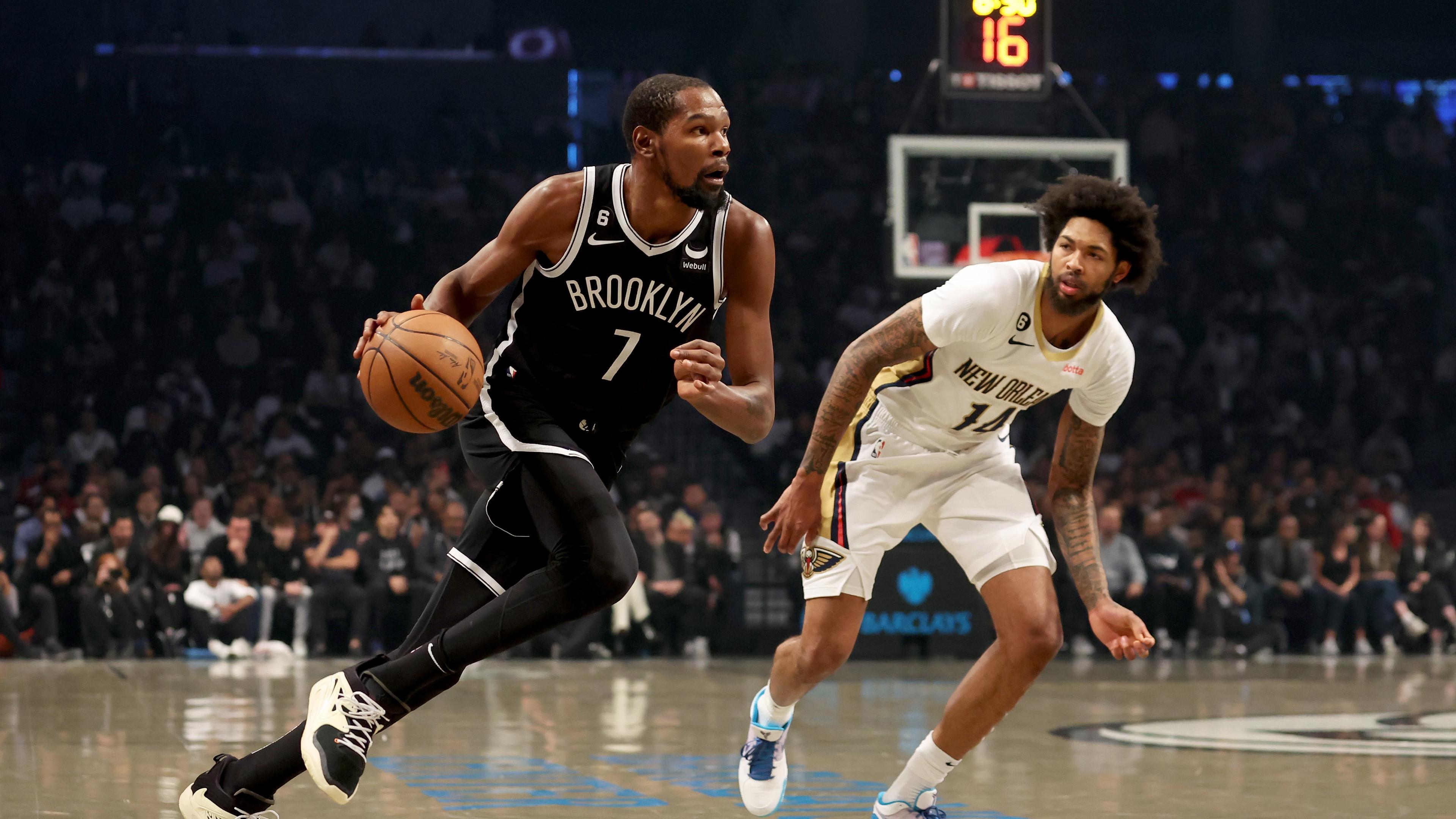 Oct 19, 2022; Brooklyn, New York, USA; Brooklyn Nets forward Kevin Durant (7) drives to the basket against New Orleans Pelicans forward Brandon Ingram (14) during the first quarter at Barclays Center. Mandatory Credit: Brad Penner-USA TODAY Sports / © Brad Penner-USA TODAY Sports