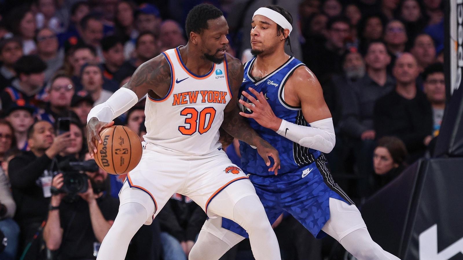 New York Knicks forward Julius Randle (30) dribbles while defended by Orlando Magic forward Chuma Okeke (3) during the first half at Madison Square Garden. / Vincent Carchietta-USA TODAY Sports