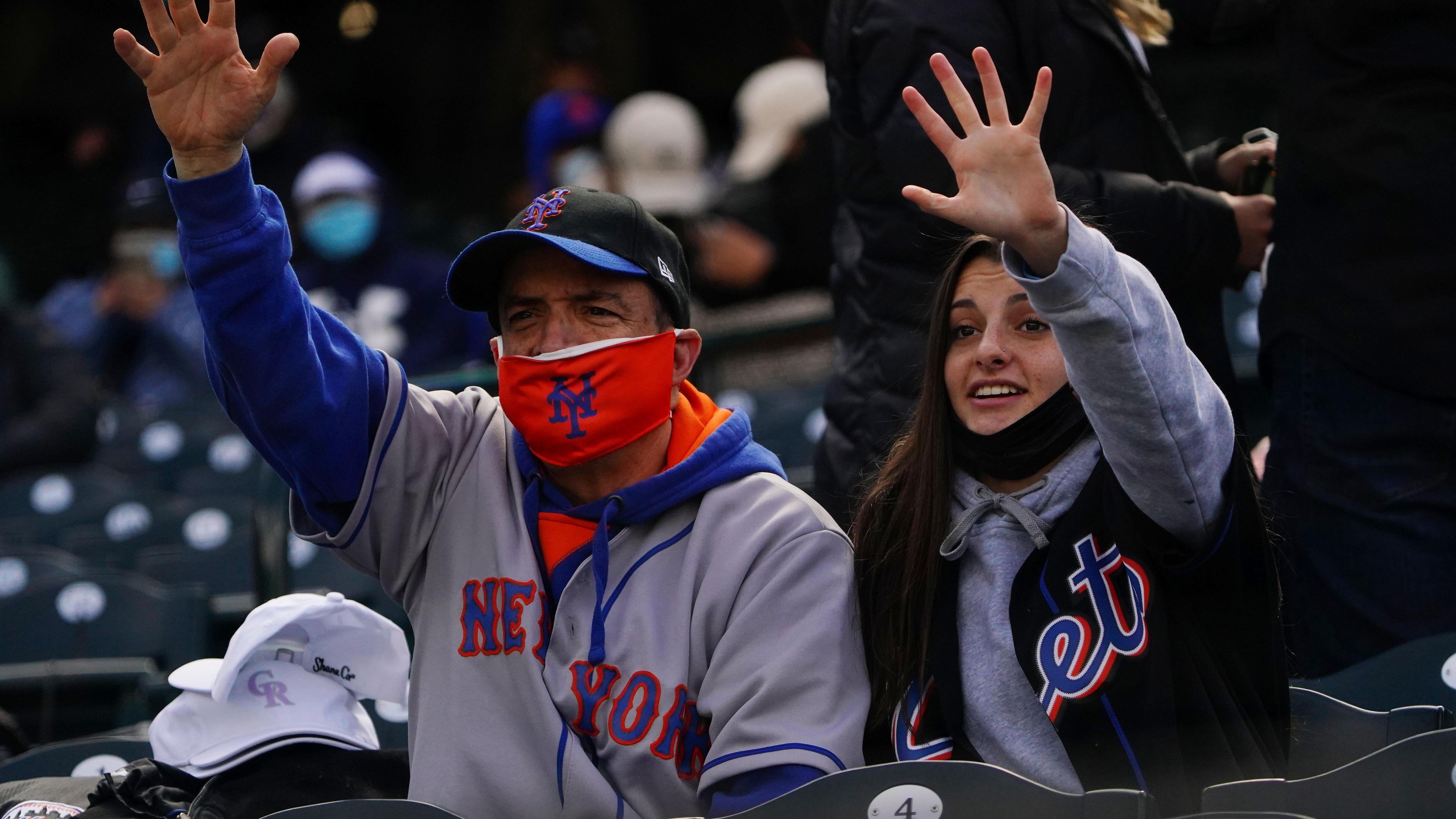 New York Mets fans cheer before the game against the Colorado Rockies at Coors Field. / Ron Chenoy-USA TODAY Sports