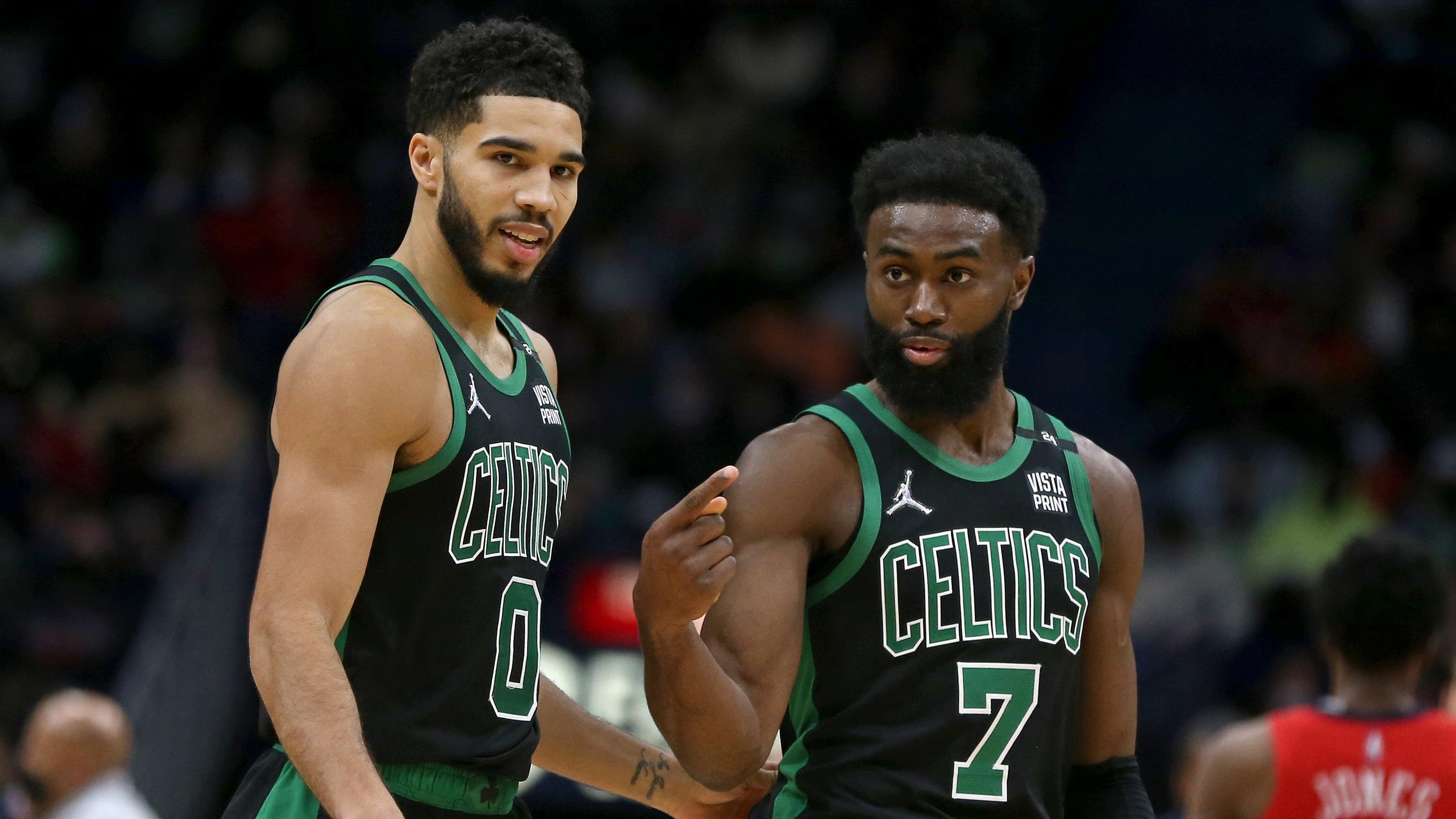 Jan 29, 2022; New Orleans, Louisiana, USA; Boston Celtics forward Jayson Tatum (0) talks to guard Jaylen Brown (7) in the second half against the New Orleans Pelicans at the Smoothie King Center. Mandatory Credit: Chuck Cook-USA TODAY Sports / © Chuck Cook-USA TODAY Sports