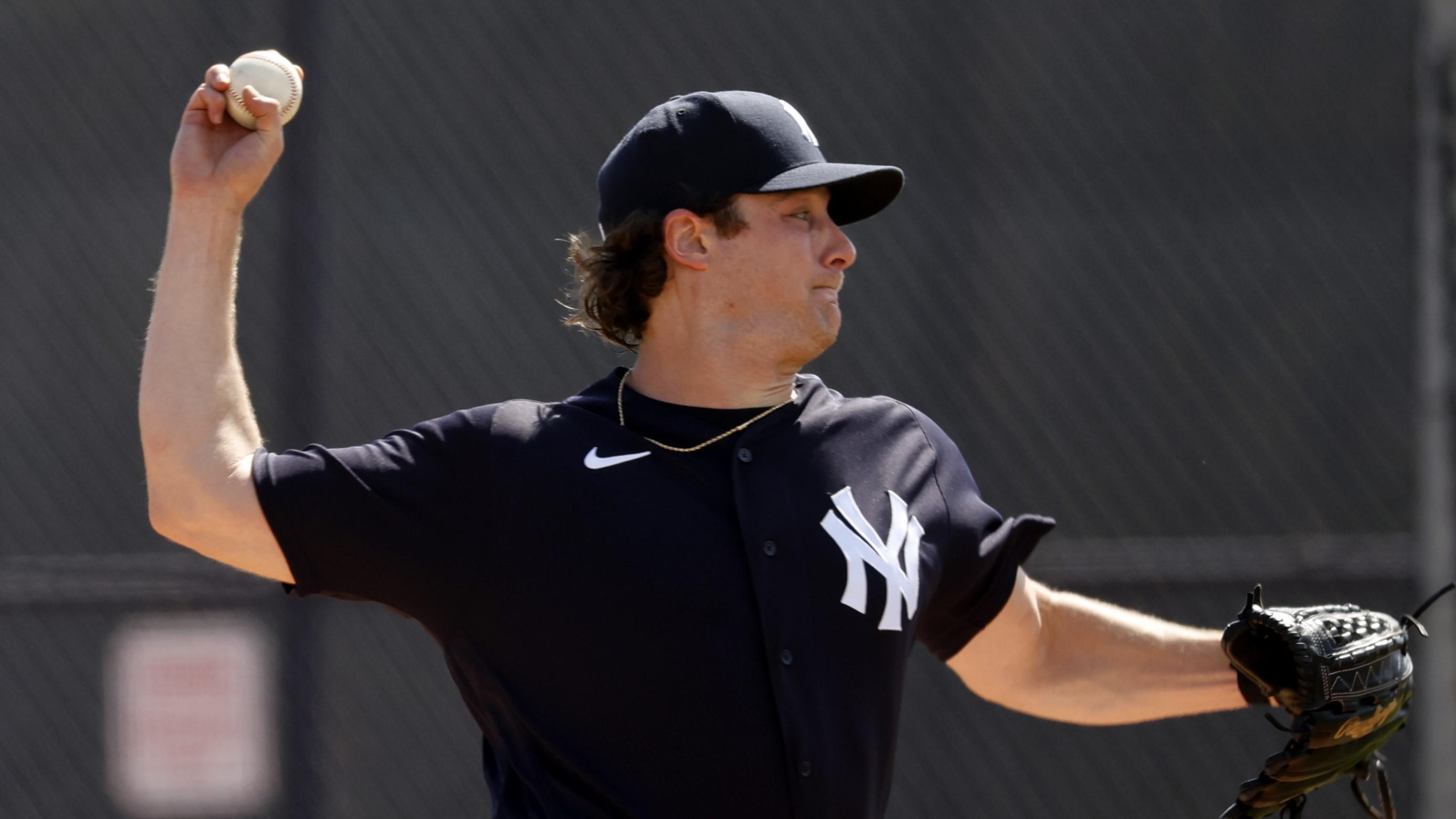 New York Yankees starting pitcher Gerrit Cole (45) throws a pitch during live batting practice during spring training at the Yankees player development complex. / Kim Klement