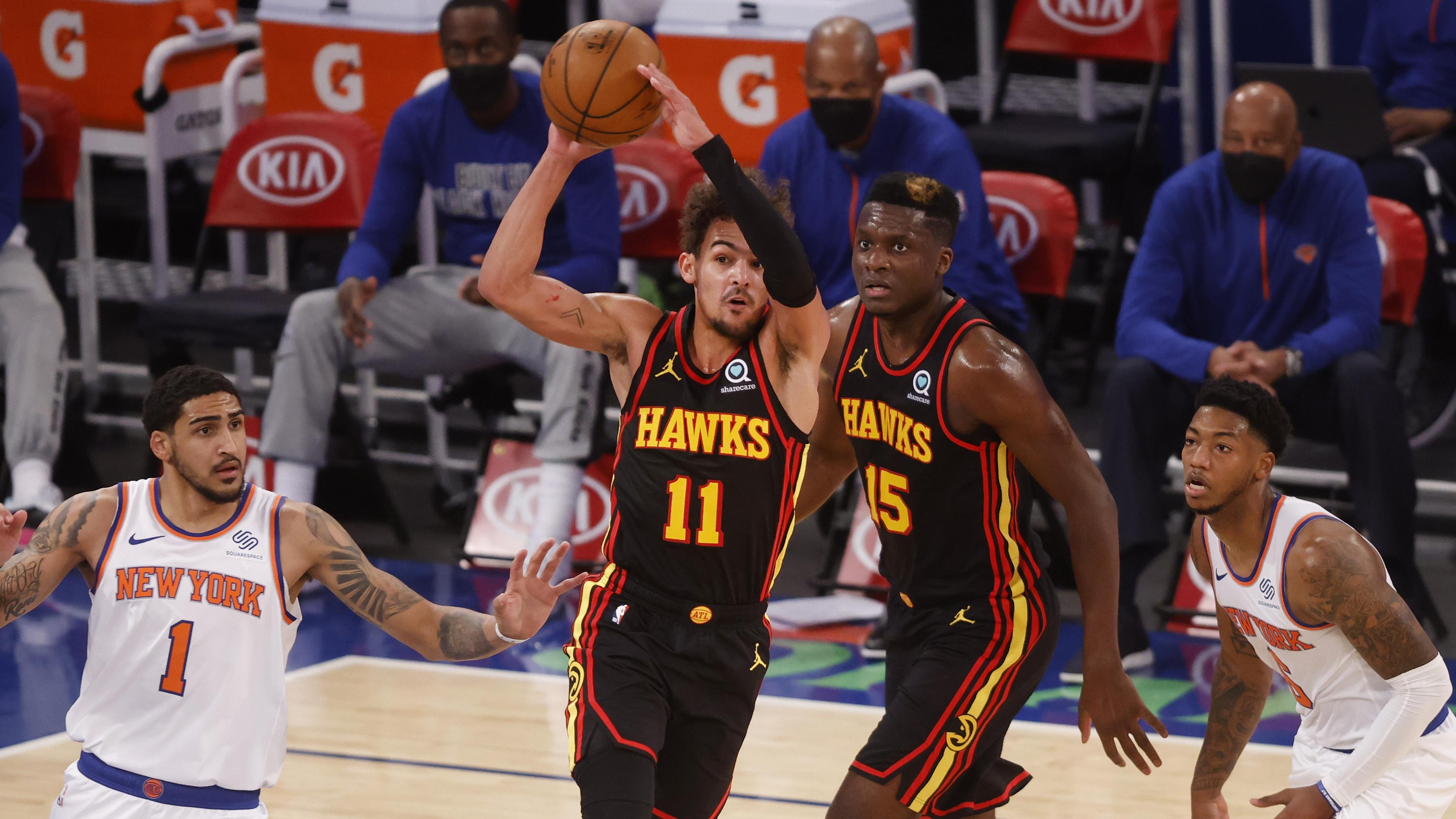 Feb 15, 2021; New York, New York, USA; Atlanta Hawks' Trae Young (11) passes away from New York Knicks' Obi Toppin (1) and Elfrid Payton (6) during the second quarter at Madison Square Garden. Mandatory Credit: Jason DeCrow/Pool Photo-USA TODAY Sports / © Pool Photo-USA TODAY Sports