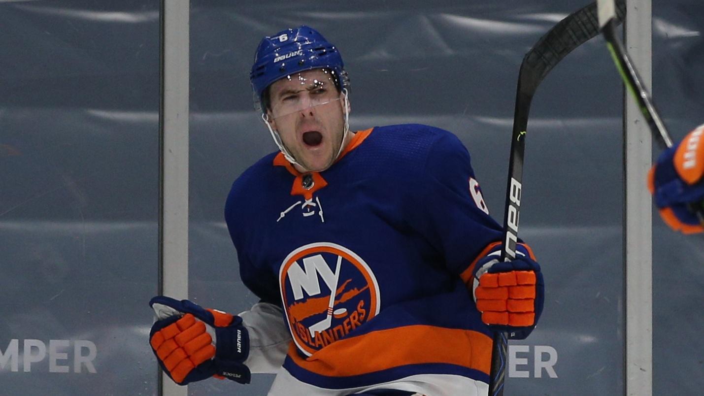 Apr 11, 2021; Uniondale, New York, USA; New York Islanders defenseman Ryan Pulock (6) celebrates his game winning goal against the New York Rangers during the overtime period at Nassau Veterans Memorial Coliseum. / © Brad Penner-USA TODAY Sports