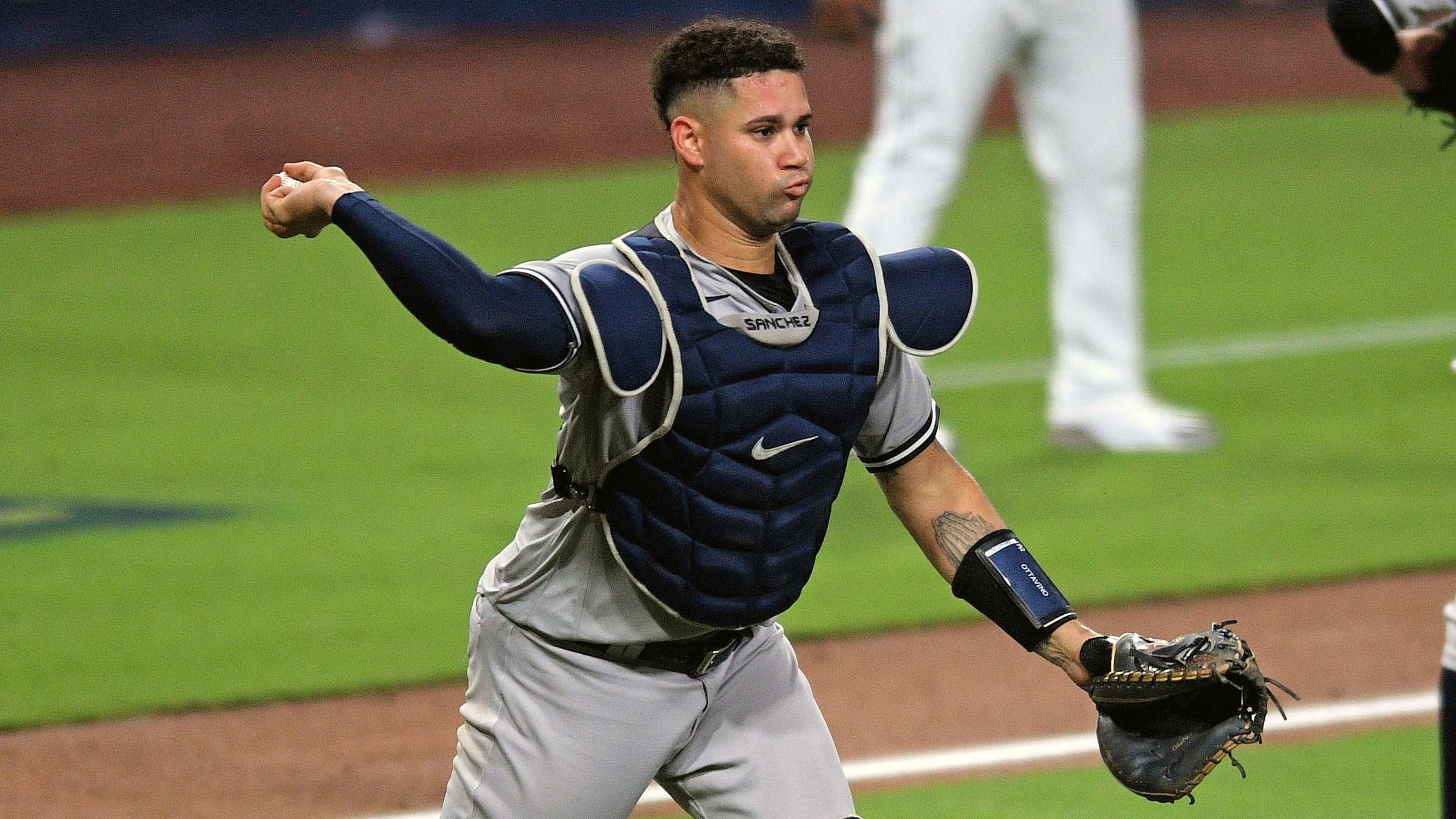 Oct 6, 2020; San Diego, California, USA; New York Yankees catcher Gary Sanchez (24) throws out Tampa Bay Rays shortstop Willy Adames (1, not pictured) in the 5th inning during game two of the 2020 ALDS at Petco Park. Mandatory Credit: Orlando Ramirez-USA TODAY Sports / © Orlando Ramirez-USA TODAY Sports