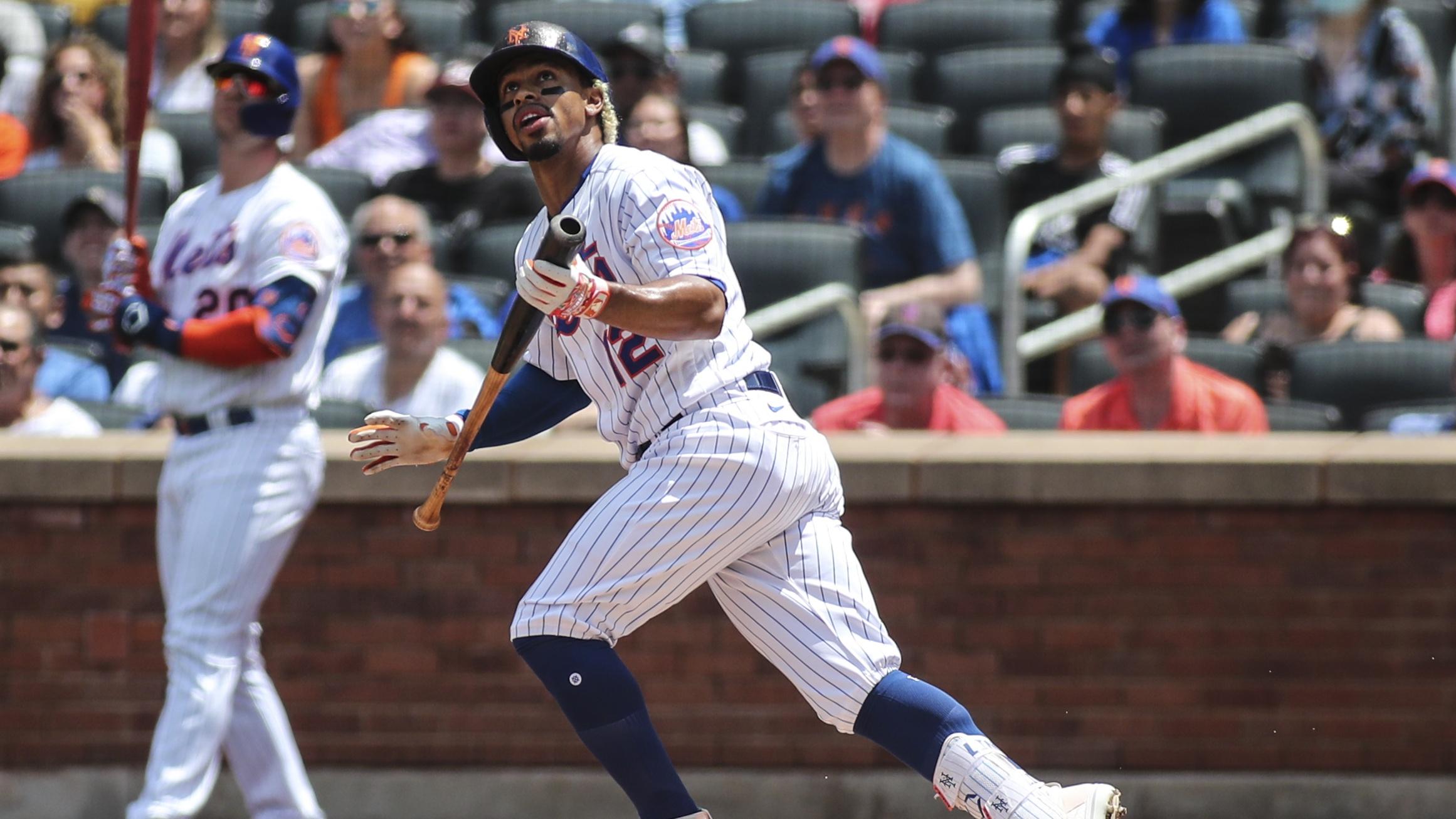 Jun 27, 2021; New York City, New York, USA; New York Mets shortstop Francisco Lindor (12) watches as a ball he hits falls in for a double in the first inning against the Philadelphia Phillies at Citi Field. / © Wendell Cruz-USA TODAY Sports